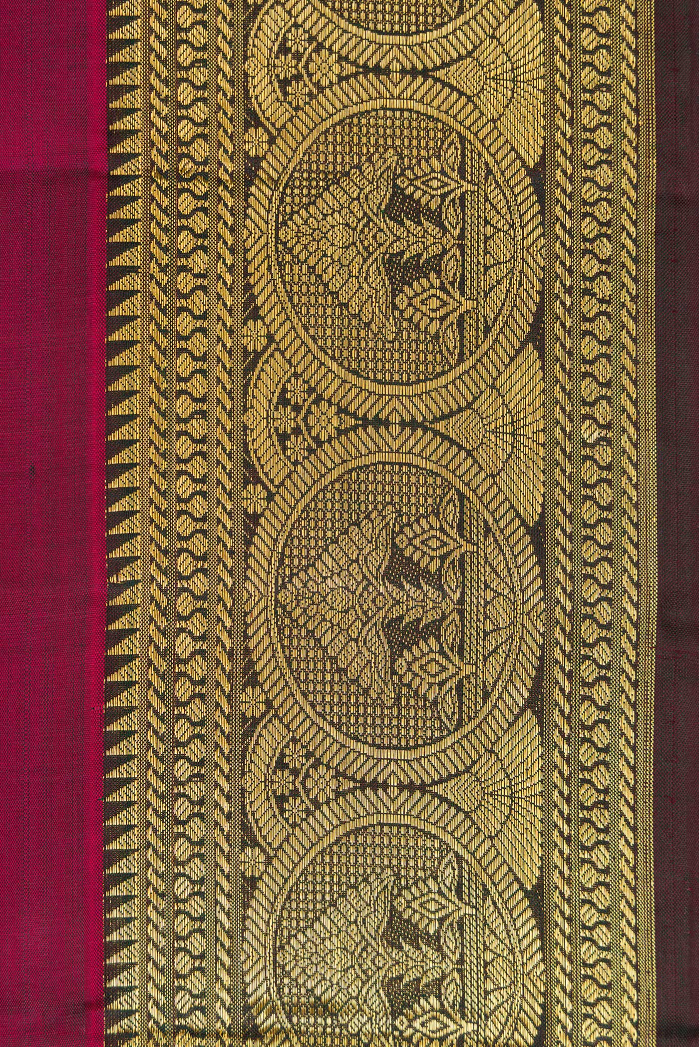 Border image of Burgundy Dual Tone Kanjivaram Silk Saree with Zari Butta on the body and Zari Border. 