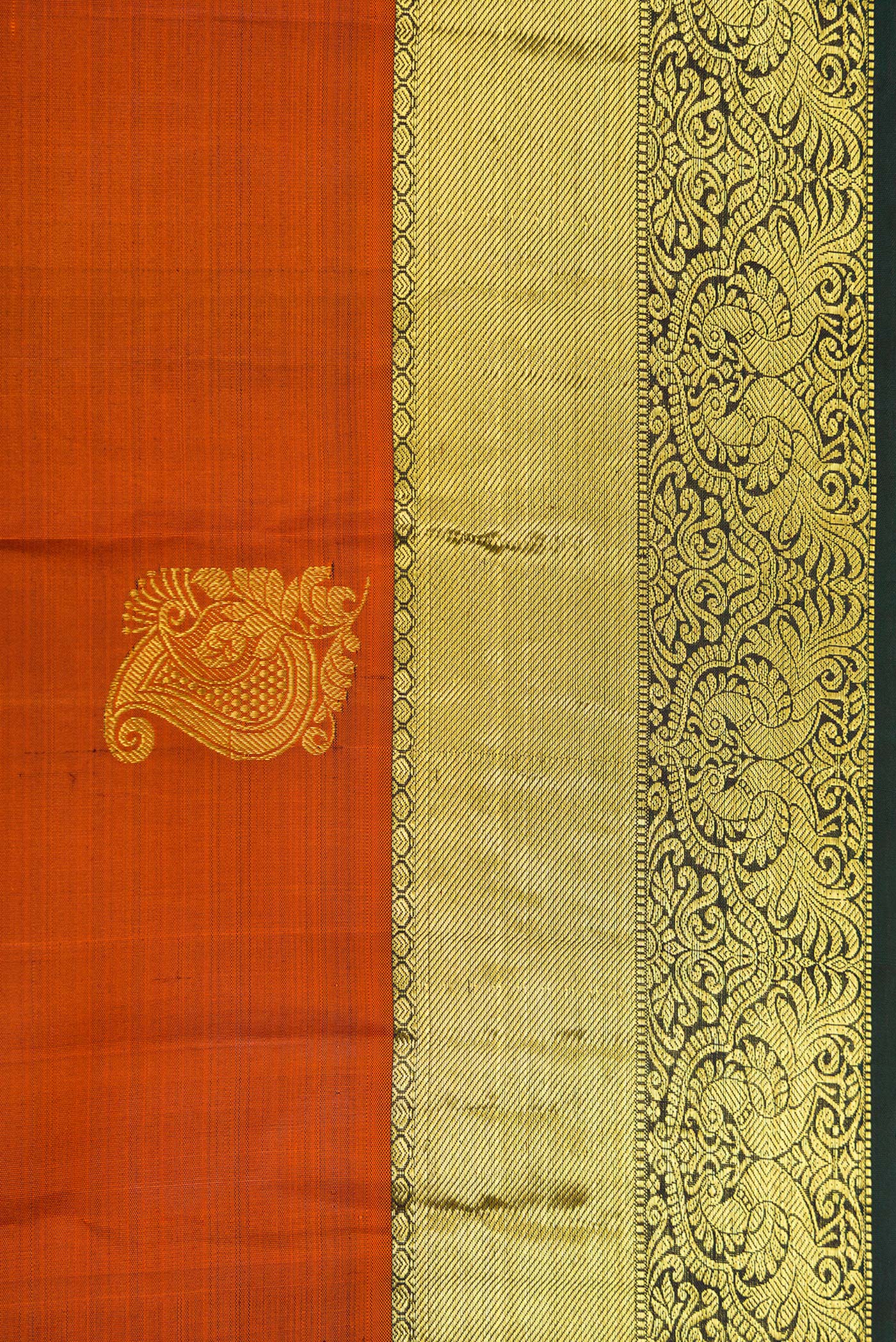 Border image of Brick Orange Dual Tone Kanjivaram Silk Saree with Zari Butta on the body and Zari Border. 