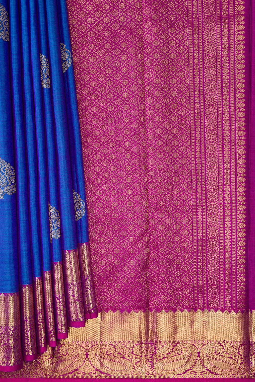 Pleats and pallu of Royal Blue Dual Tone Kanjivaram Silk Saree with Zari Butta on the body and Zari Border. 