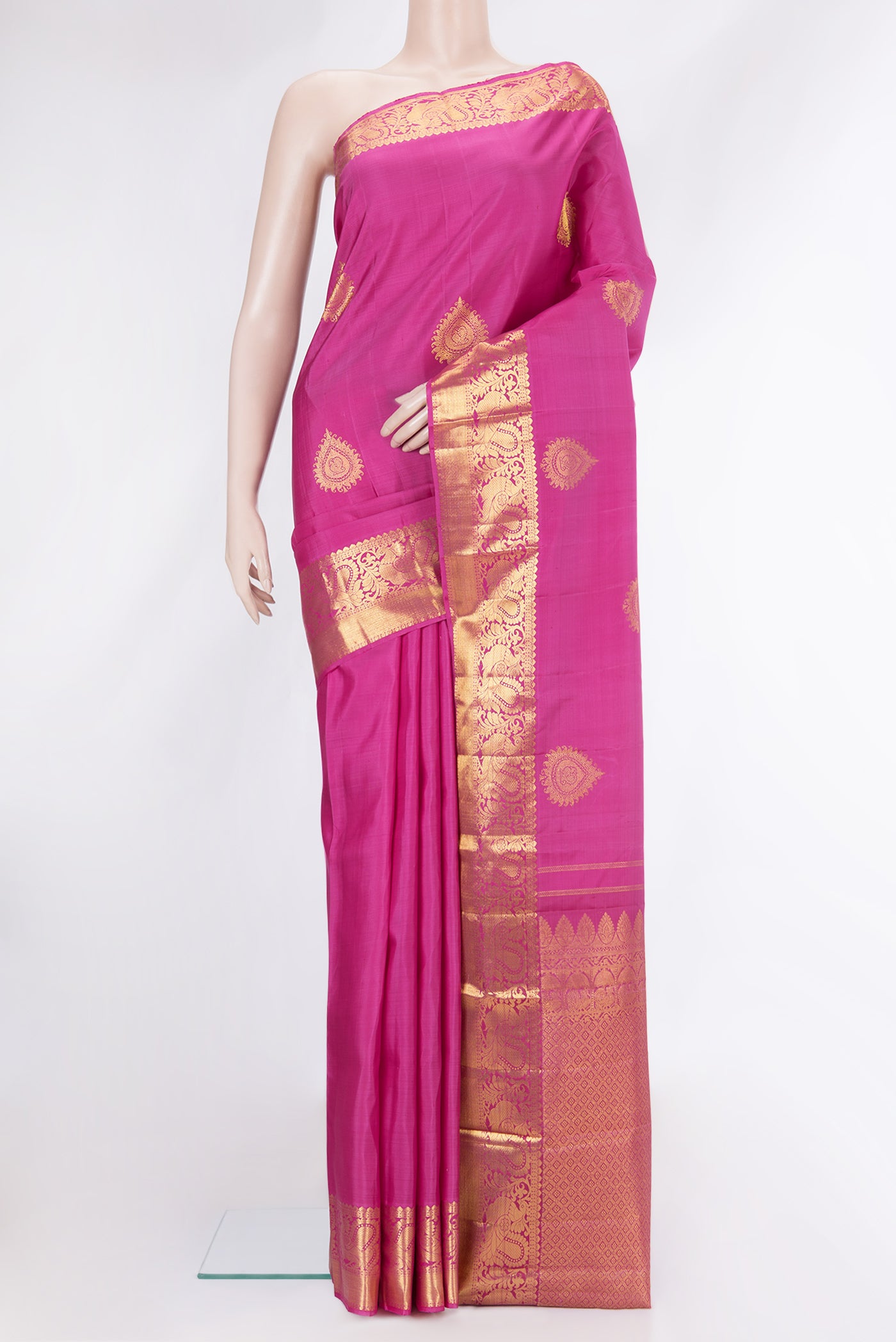 Pink Dual Tone Kanjivaram Silk Saree with Zari Butta on the body and Zari Border.  displayed on a mannequin