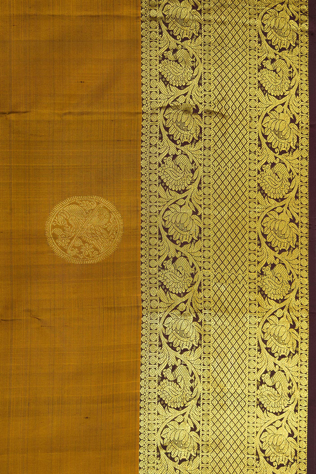 Border image of Gold Dual Tone Kanjivaram Silk Saree with Zari Butta on the body and Zari Border. 
