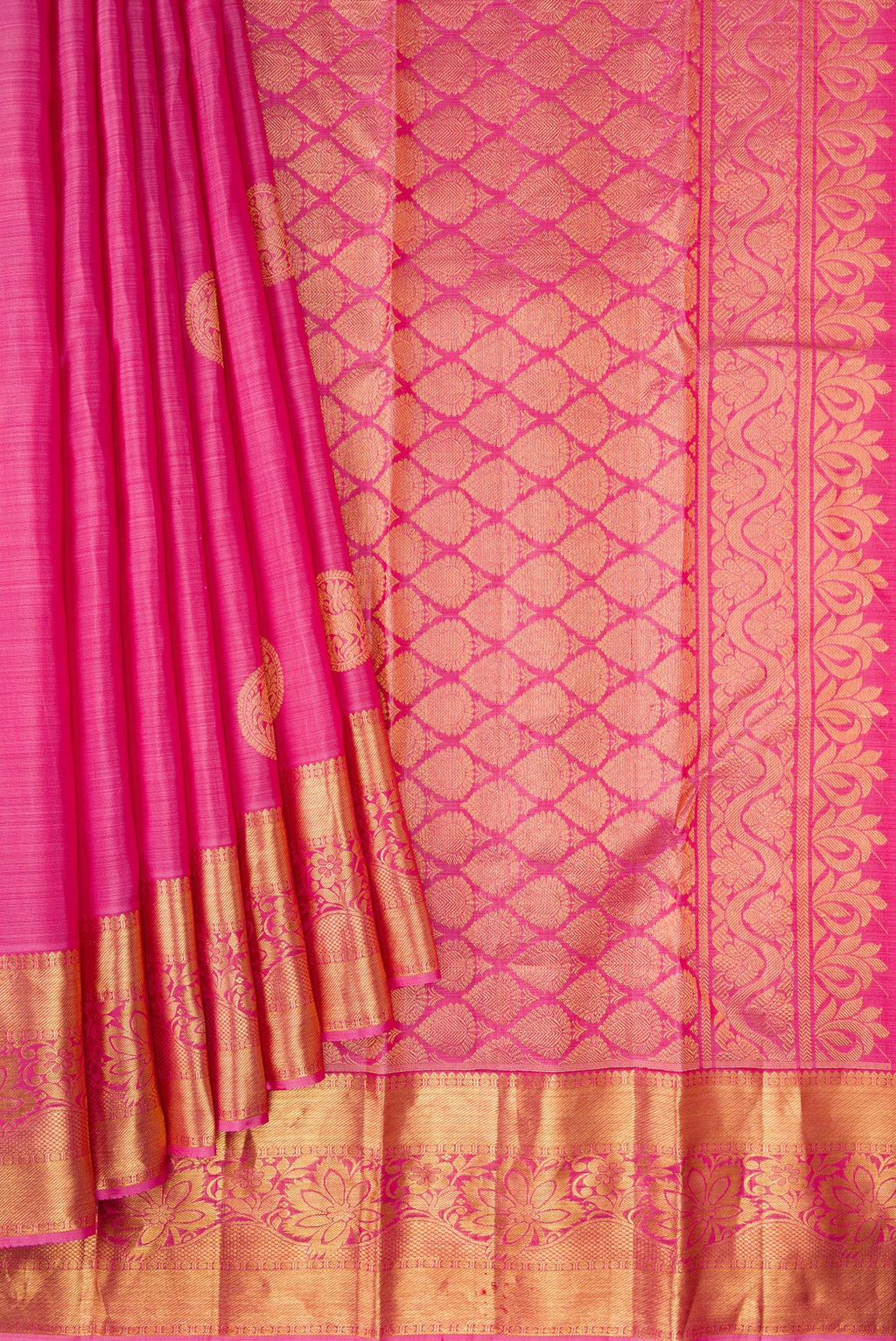 Pleats and pallu of Pink Kanjivaram Silk Saree with Zari Butta on the body and Zari Border. 