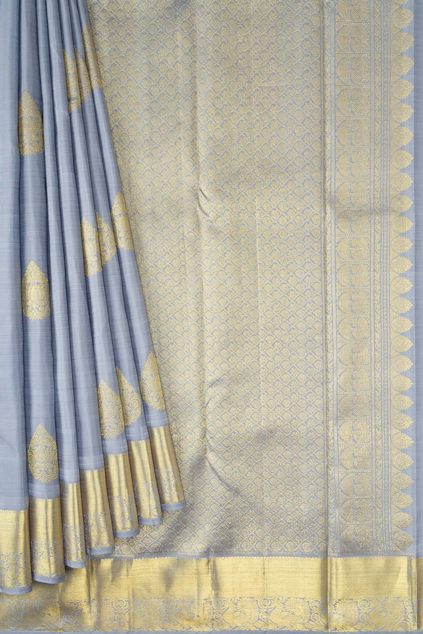 Pleats and pallu of Grey Dual Tone Kanjivaram Silk Saree with Zari Butta on the body and Zari Border. 