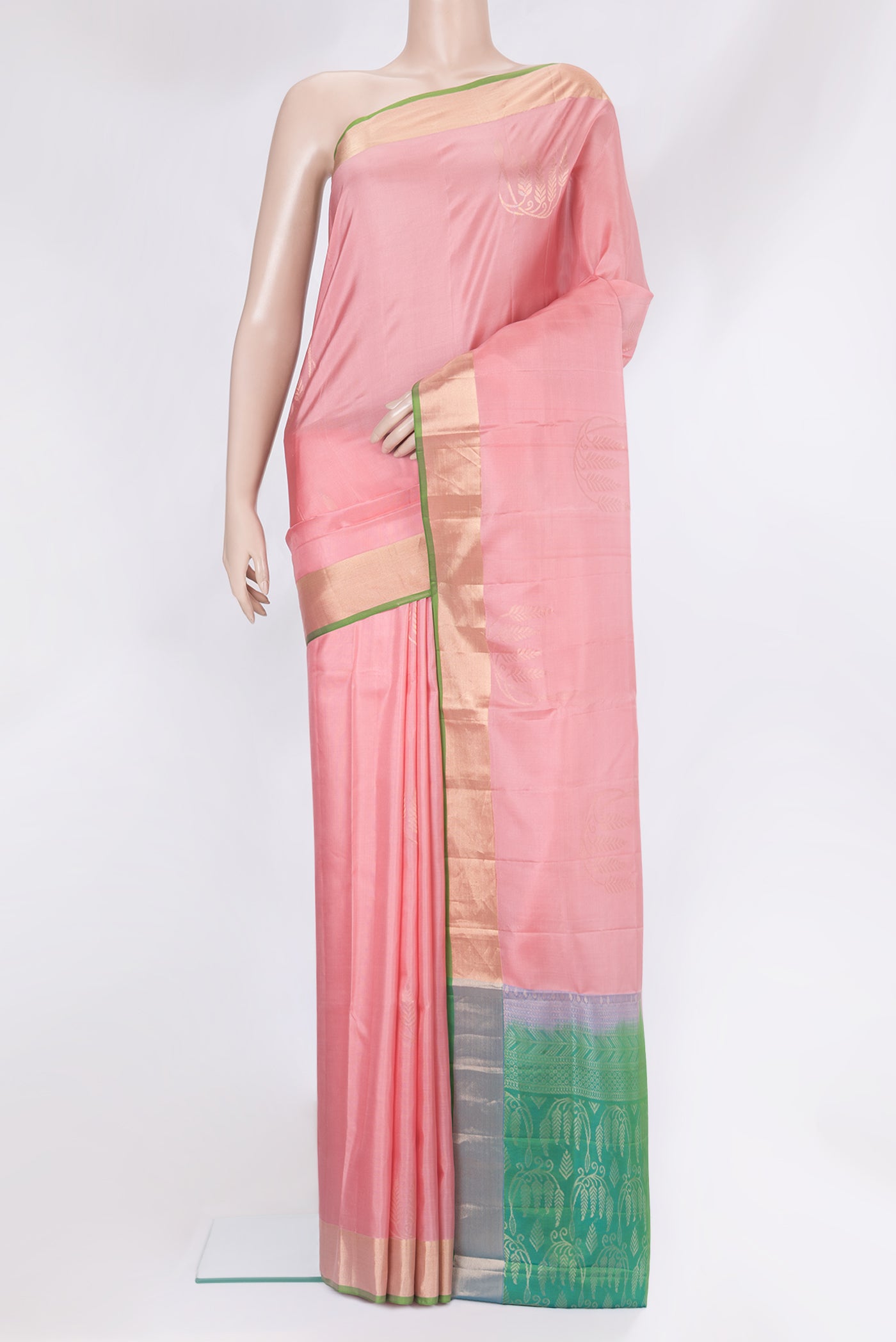 Rose pink Soft Silk Saree with Zari Butta on the body and Zari Border.  displayed on a mannequin