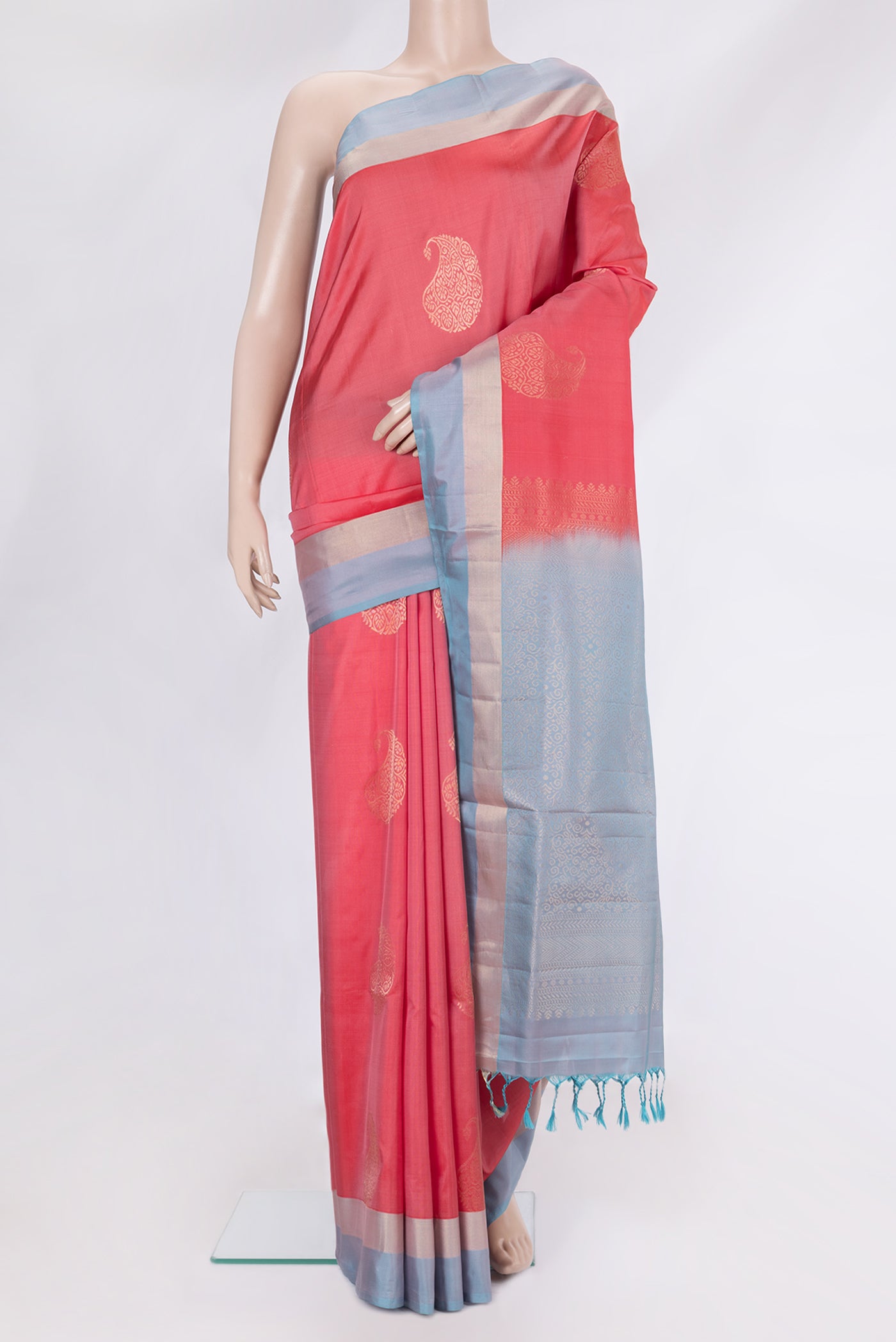 Pink Soft Silk Saree with Zari Butta on the body and Zari Border.  displayed on a mannequin