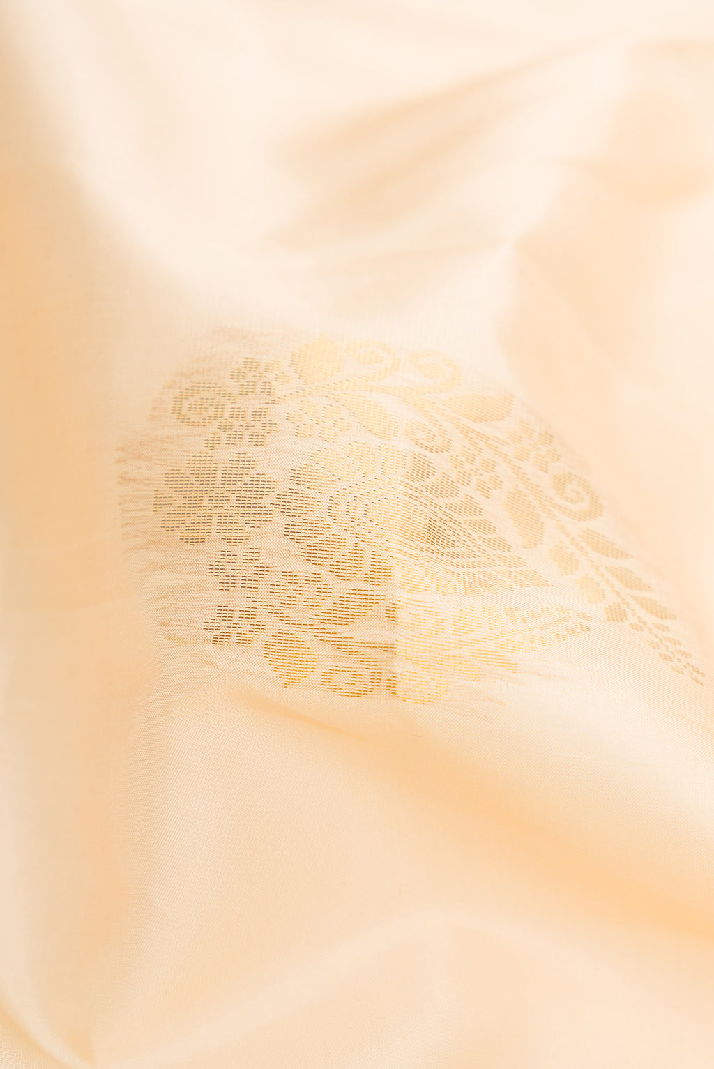 Close up of Sandal Dual Tone Soft Silk Saree with Zari Butta on the body and Zari Border.  displaying folds