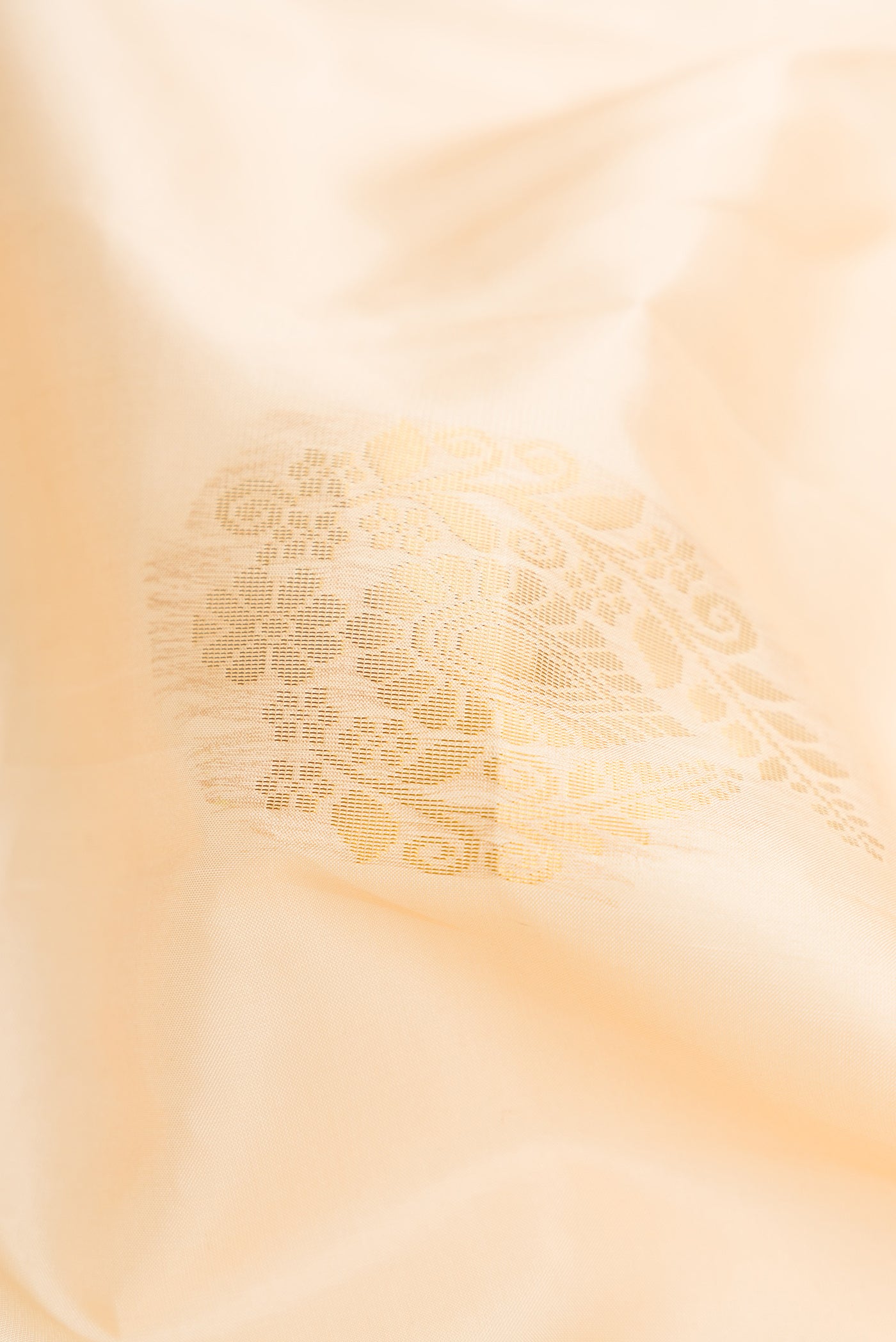 Close up of Sandal Dual Tone Soft Silk Saree with Zari Butta on the body and Zari Border.  displaying folds