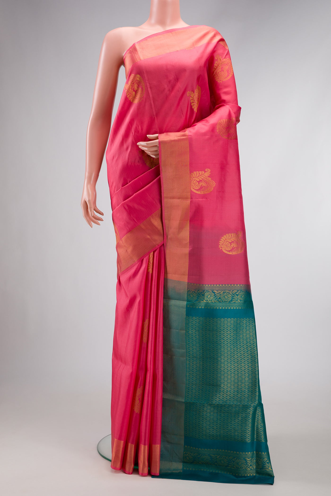 Pink Dual Tone Soft Silk Saree with Zari Butta on the body and Zari Border.  displayed on a mannequin