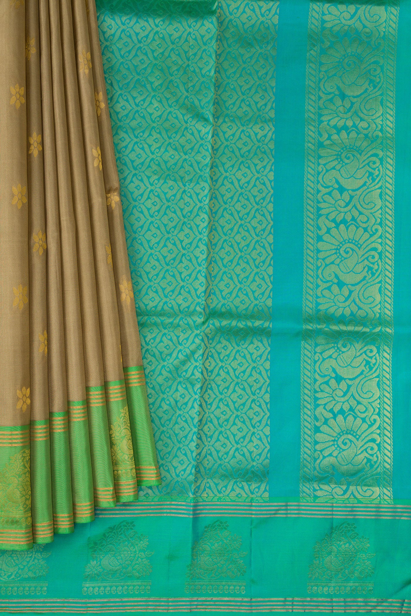 Pleats and pallu of Dark Beige Soft Silk Saree with Zari Butta on the body and Zari Border. 