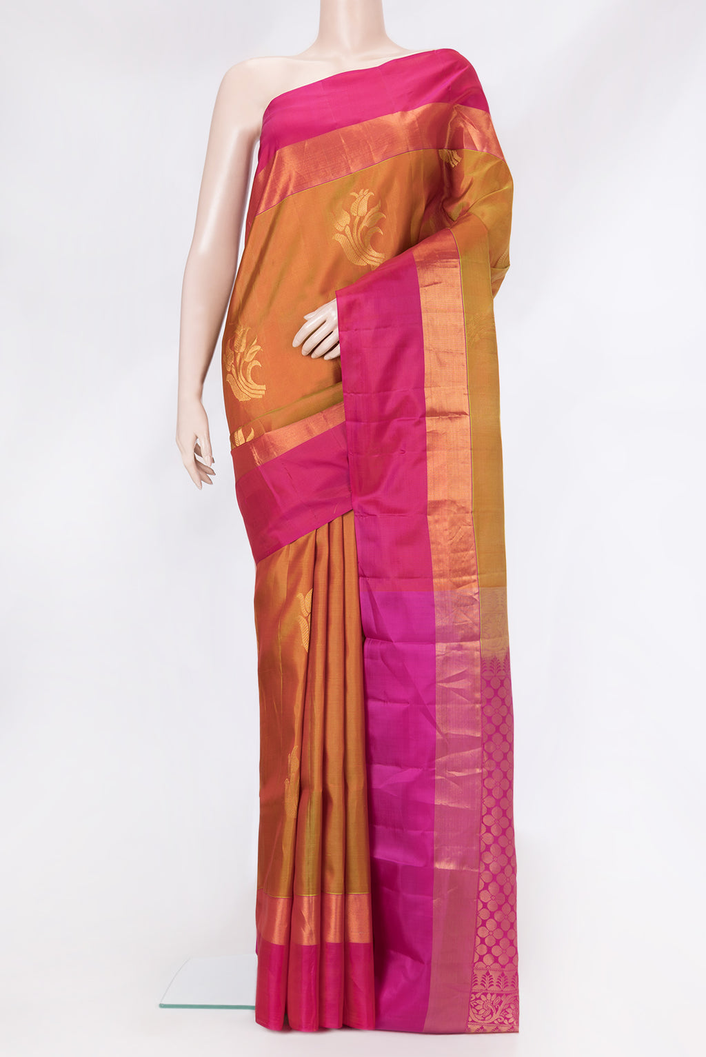 Mehandi Green Dual Tone Soft Silk Saree with Zari Butta on the body and Zari Border.  displayed on a mannequin