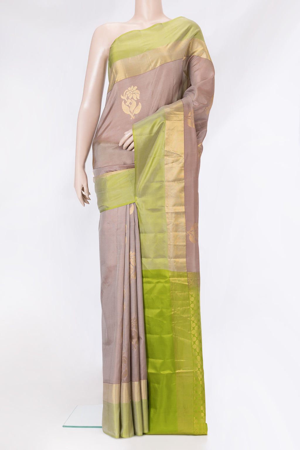 Brown Dual Tone Soft Silk Saree with Zari Butta on the body and Zari Border.  displayed on a mannequin