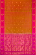 Brick Orange Dual Tone Soft Silk Saree with Zari Butta on the body and Fancy Border.  displayed on a mannequin