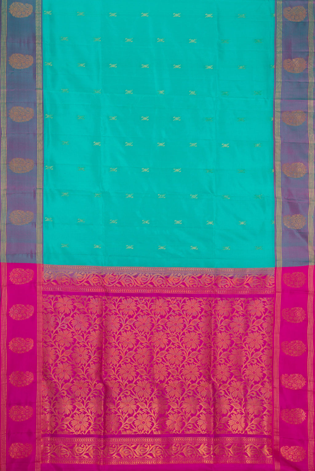 Sky Blue Dual Tone Soft Silk Saree with Zari Butta on the body and Fancy Border.  displayed on a mannequin