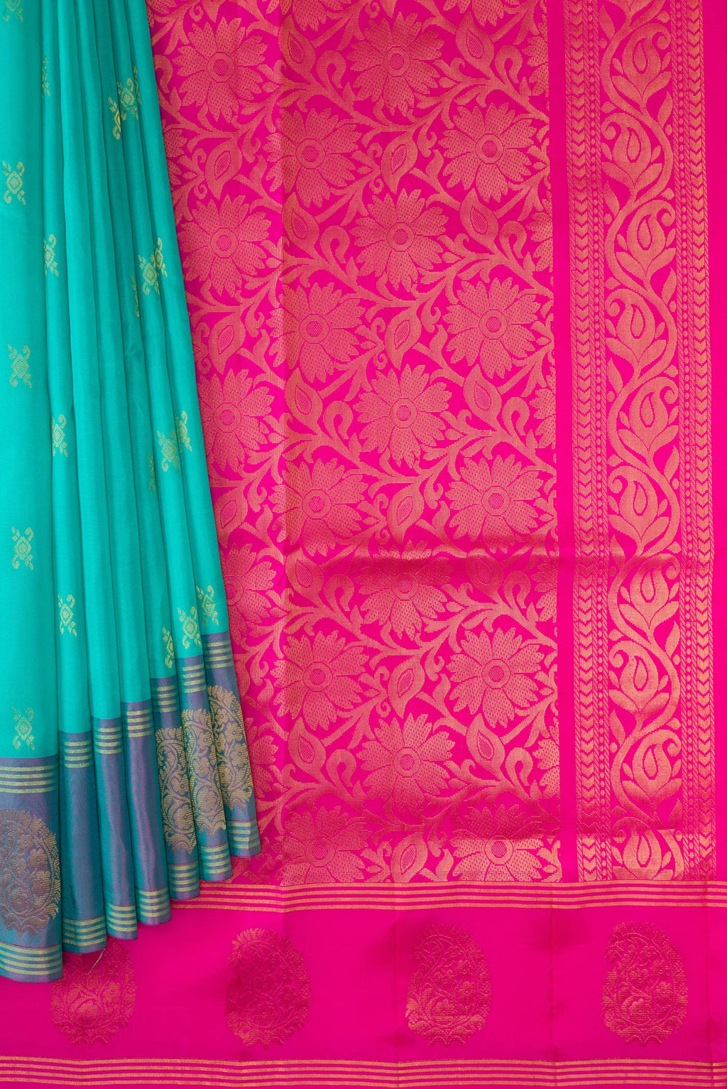 Pleats and pallu of Sky Blue Dual Tone Soft Silk Saree with Zari Butta on the body and Fancy Border. 