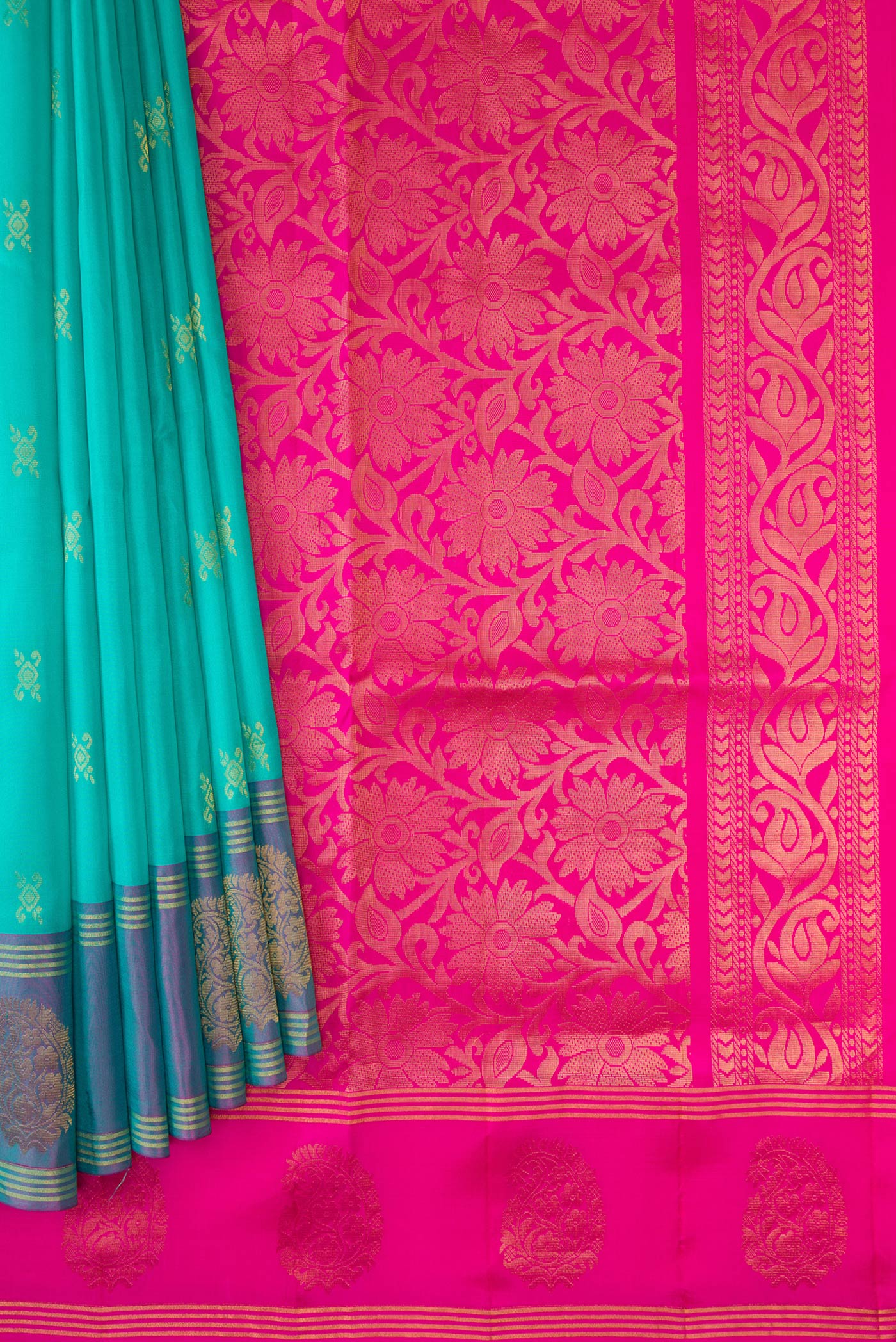 Pleats and pallu of Sky Blue Dual Tone Soft Silk Saree with Zari Butta on the body and Fancy Border. 