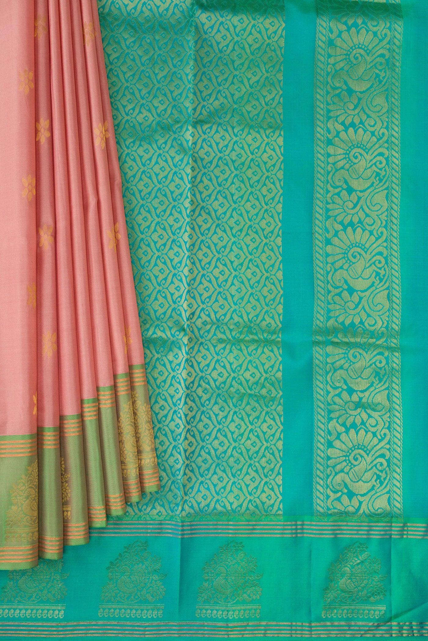 Pleats and pallu of Rose Gold Soft Silk Saree with Zari Butta on the body and Fancy Border. 
