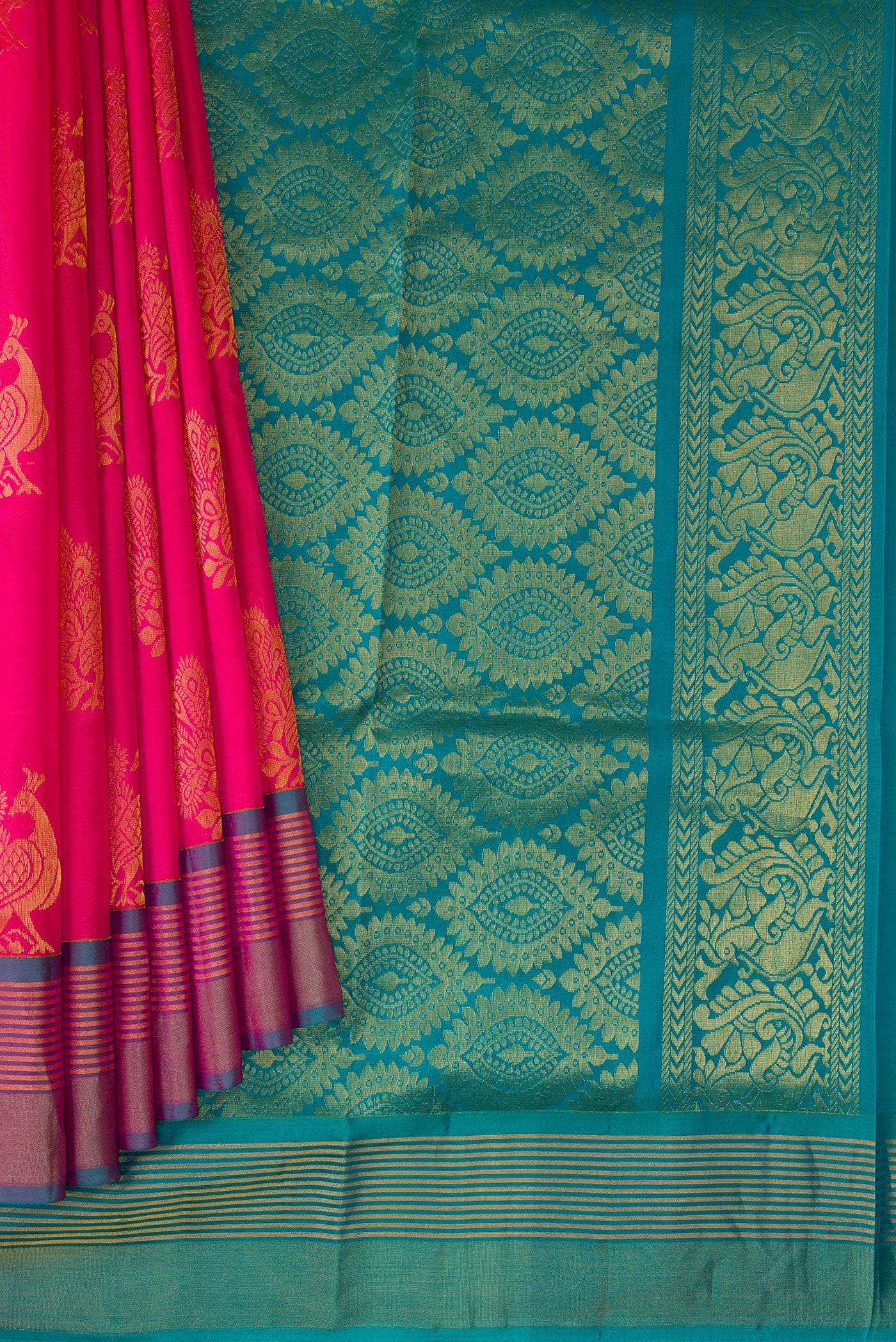 Pleats and pallu of Pink Soft Silk Saree with Zari Butta on the body and Zari Border. 