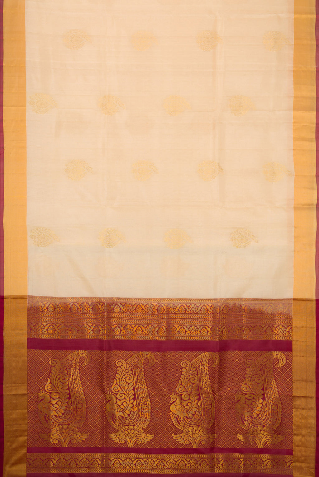 Sandal Dual Tone Soft Silk Saree with Zari Butta on the body and Zari Border.  displayed on a mannequin