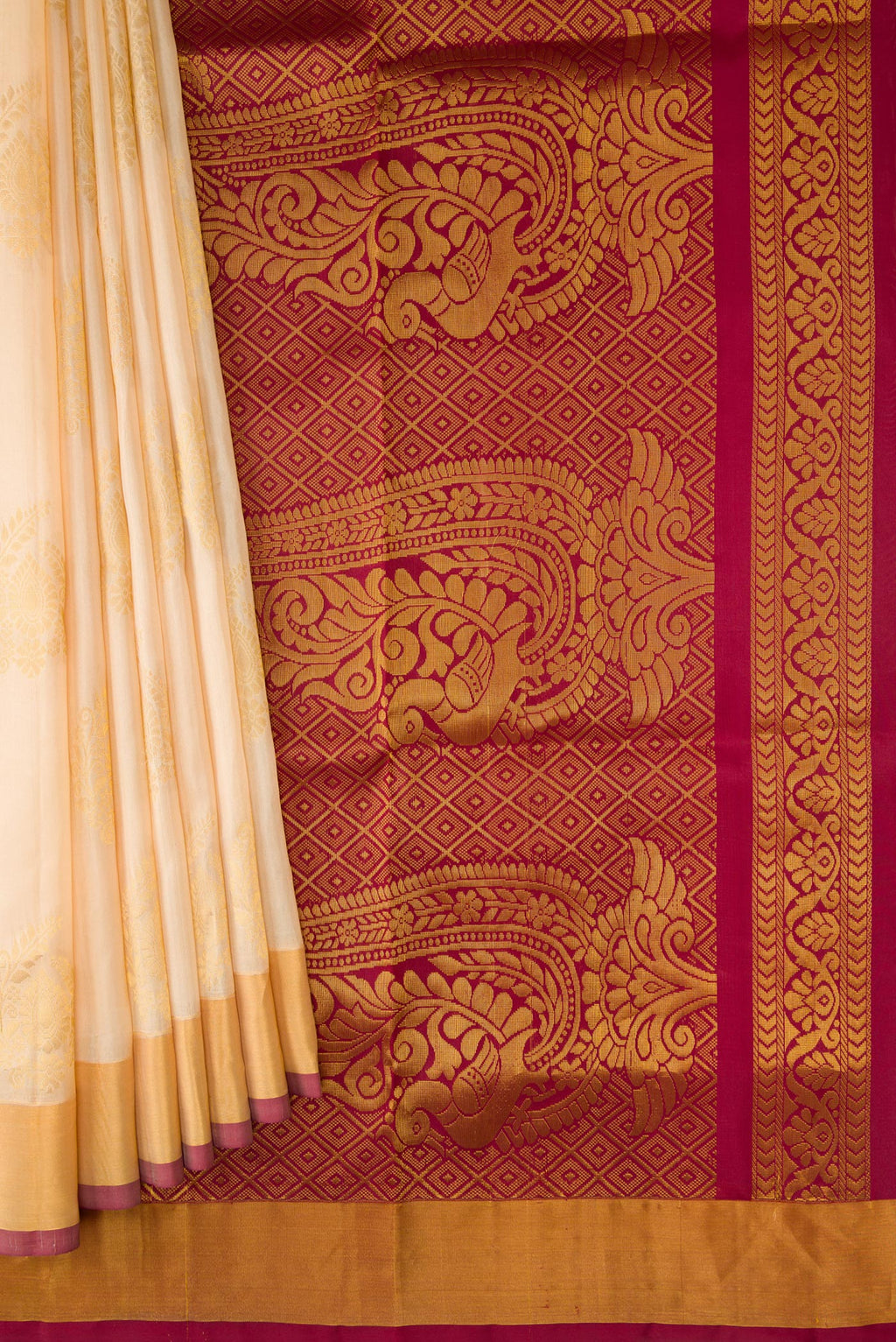 Pleats and pallu of Sandal Dual Tone Soft Silk Saree with Zari Butta on the body and Zari Border. 