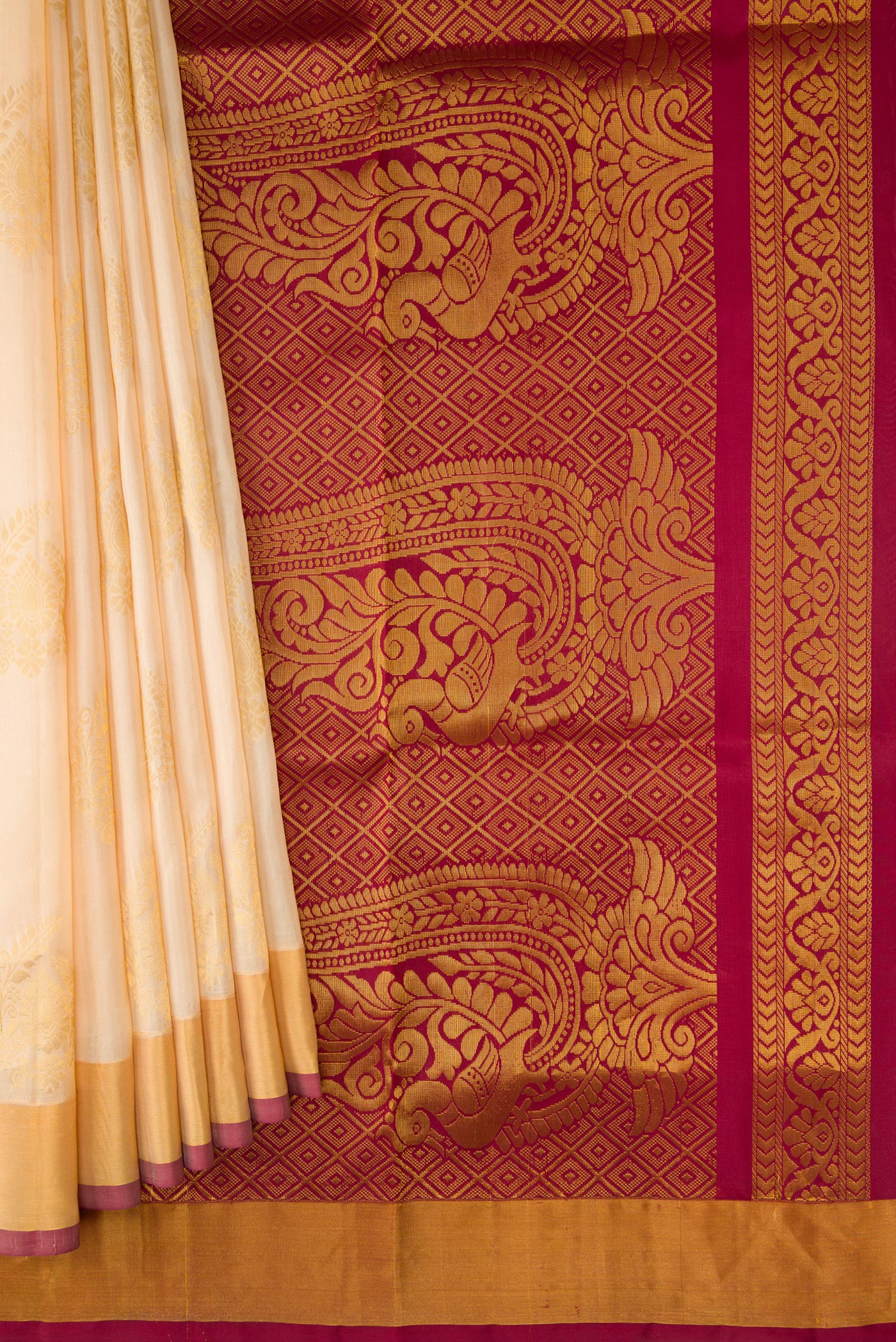 Pleats and pallu of Sandal Dual Tone Soft Silk Saree with Zari Butta on the body and Zari Border. 