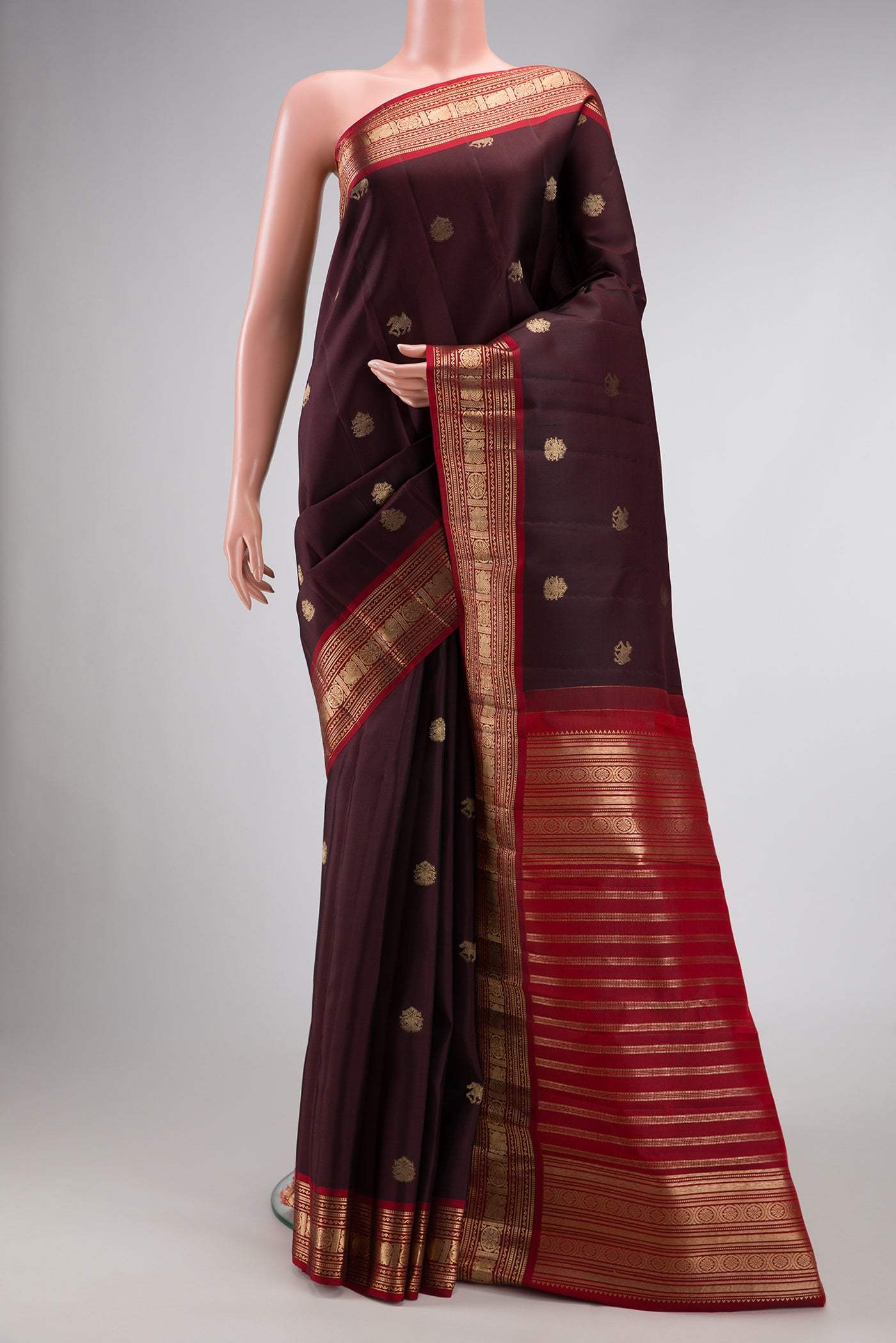 Coffee Brown Dual Tone Kanjivaram Silk Saree with Zari Brocade on the body and Zari Border.  displayed on a mannequin