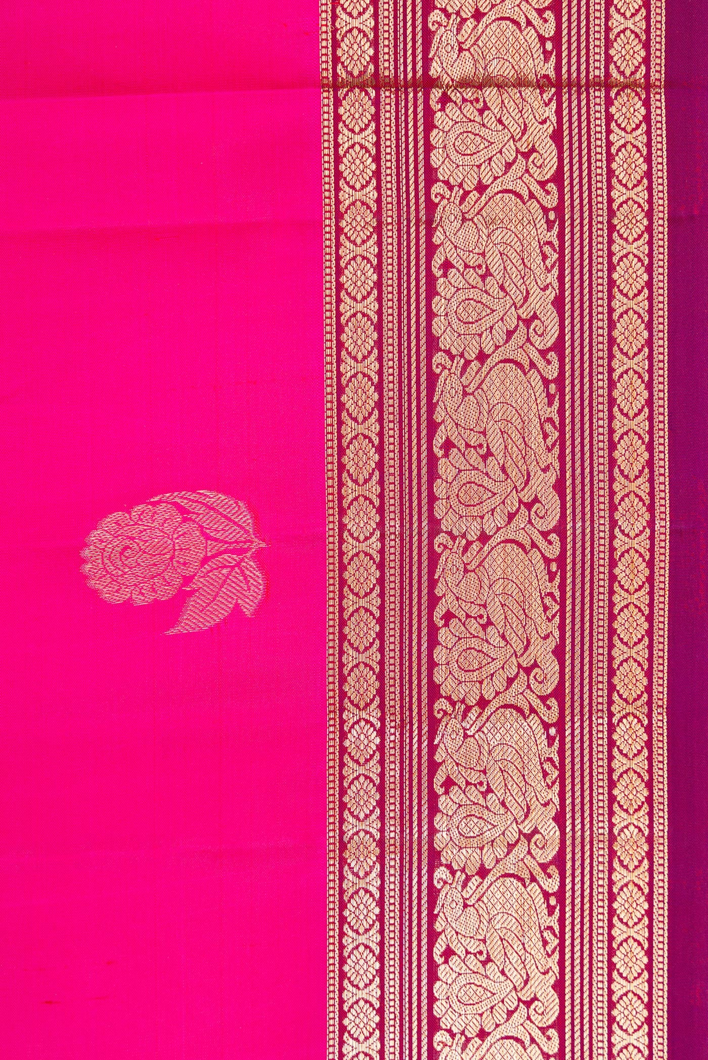 Border image of Magenta Dual Tone Kanjivaram Silk Saree with Zari Butta on the body and Zari Border. 