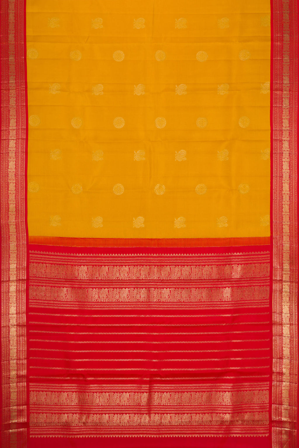Flat view of Yellow Dual Tone Kanchipuram Silk Saree with Zari Butta on the body and Zari Border. 
