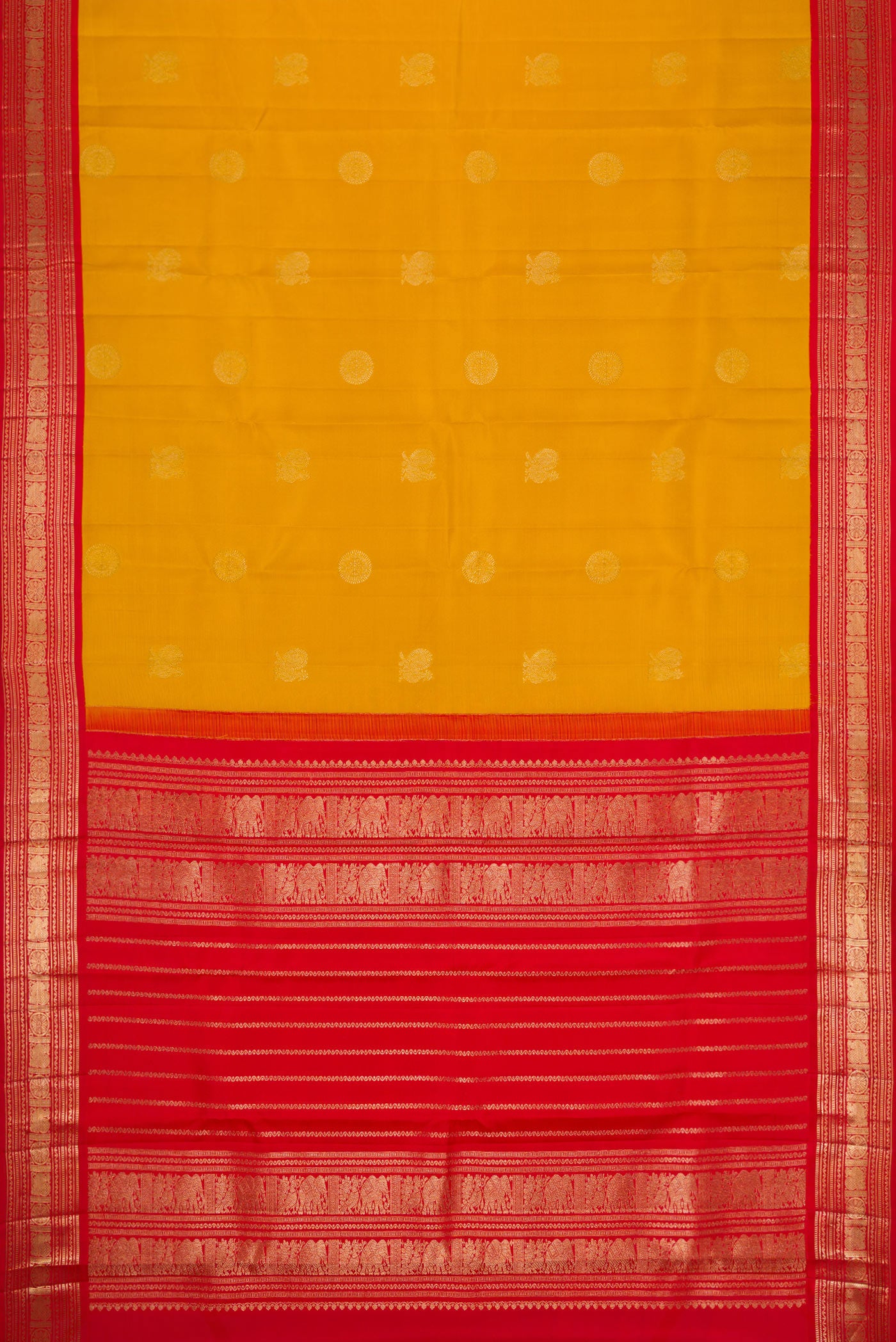 Flat view of Yellow Dual Tone Kanchipuram Silk Saree with Zari Butta on the body and Zari Border. 