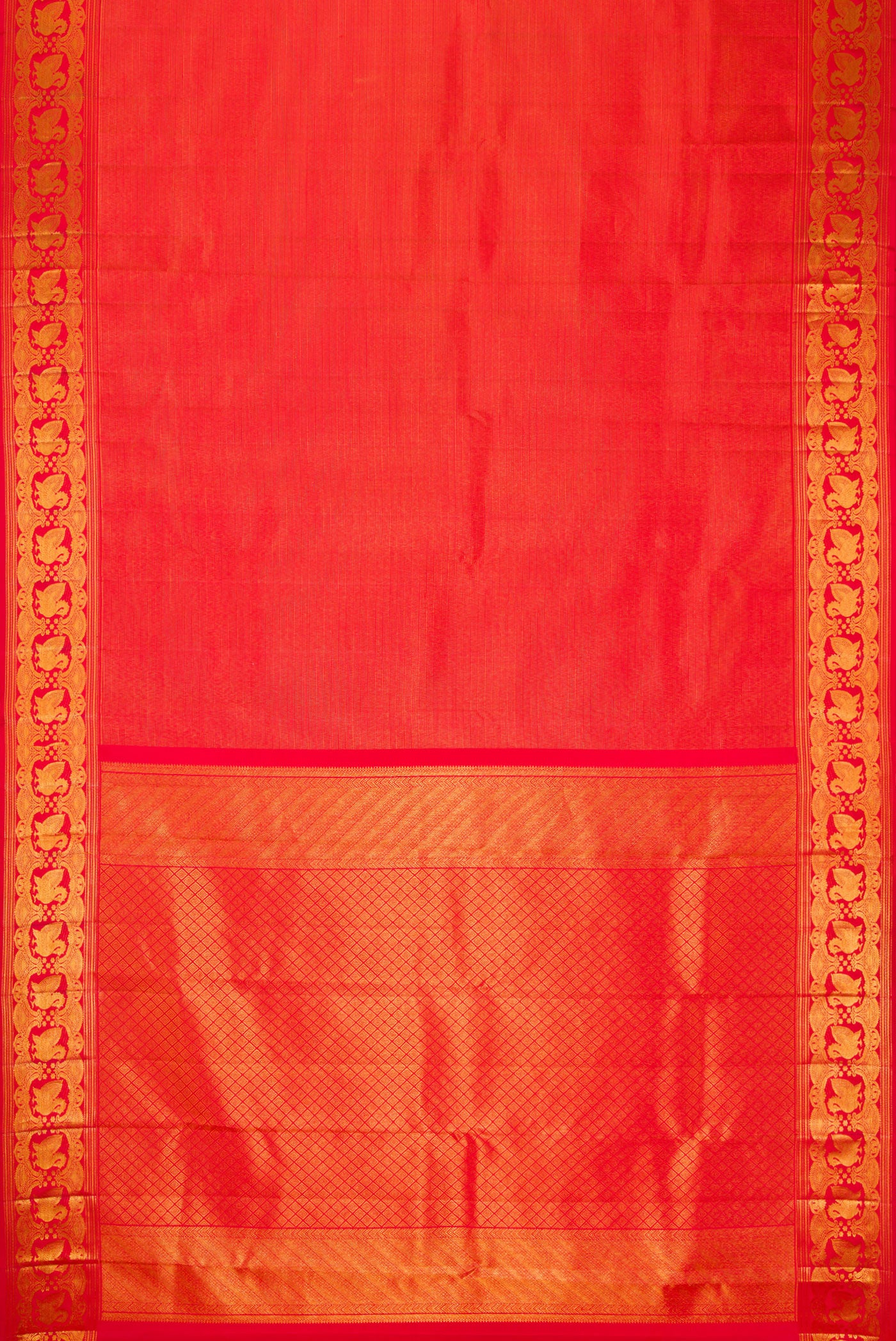 Flat view of Red Dual Tone Kanchipuram Silk Saree with Zari Brocade on the body and Zari Border. 