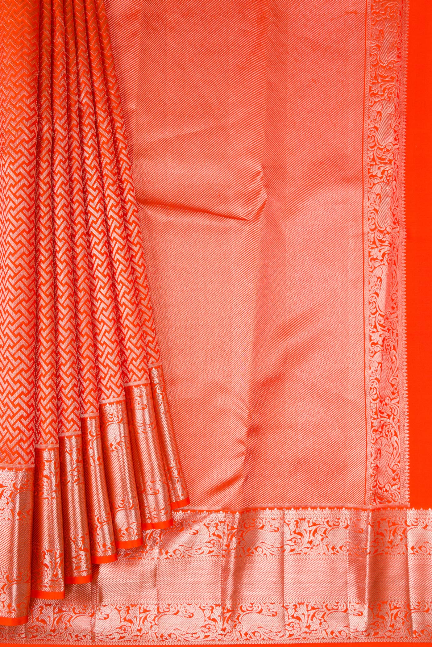 Pleats and pallu of Orange Dual Tone Kanchipuram Silk Saree with Zari Brocade on the body and Zari Border. 