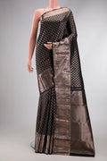 Black Dual Tone Kanchipuram Silk Saree with Zari Brocade on the body and Zari Border.  displayed on a mannequin