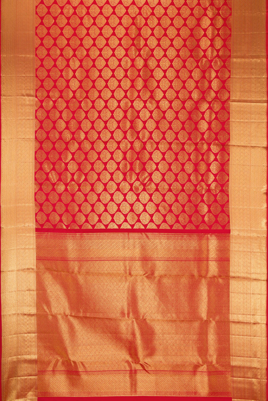 Flat view of Red Dual Tone Kanchipuram Silk Saree with Zari Brocade on the body and Zari Border. 