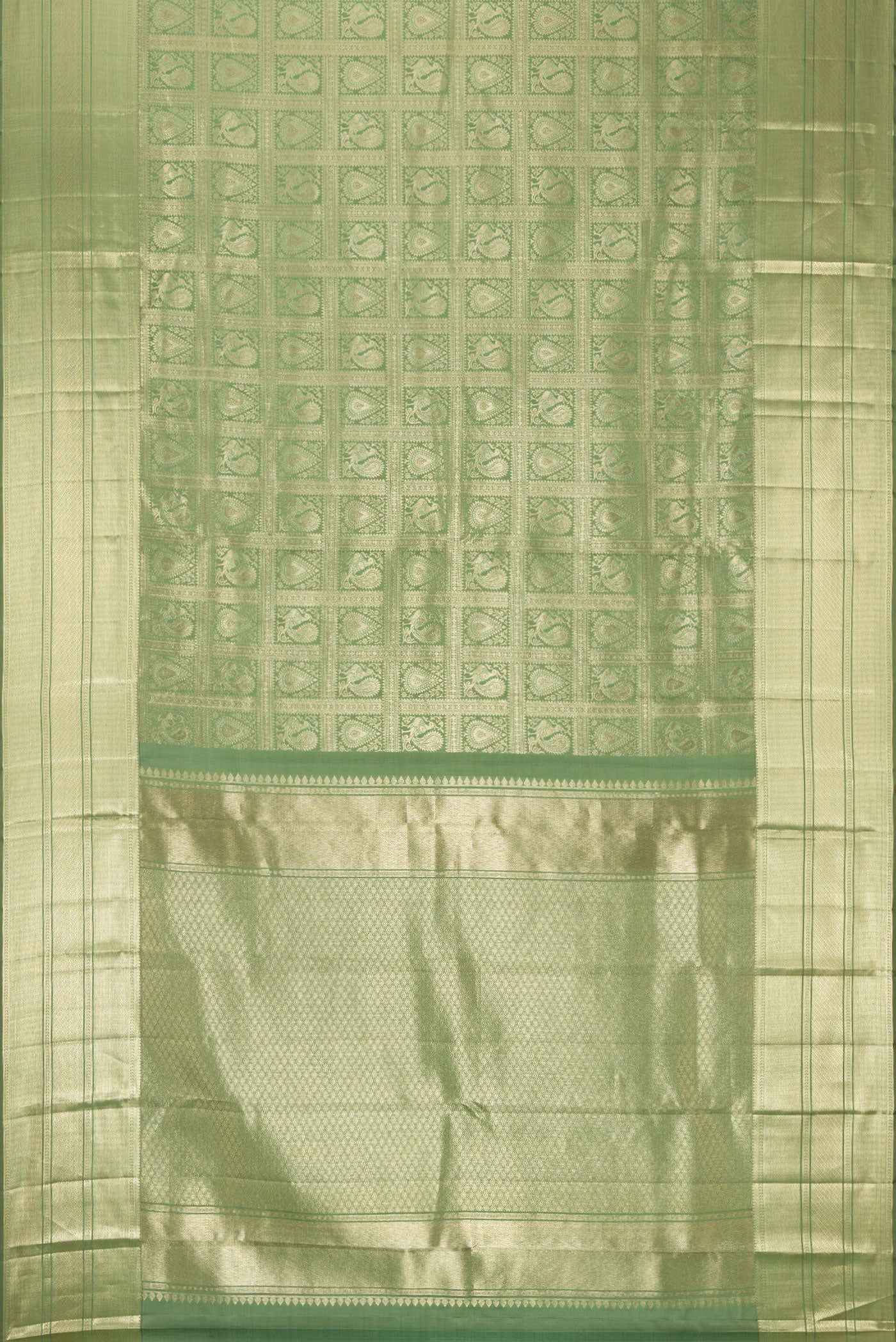 Flat view of Pista Green Dual Tone Kanchipuram Silk Saree with Zari Brocade on the body and Zari Border. 
