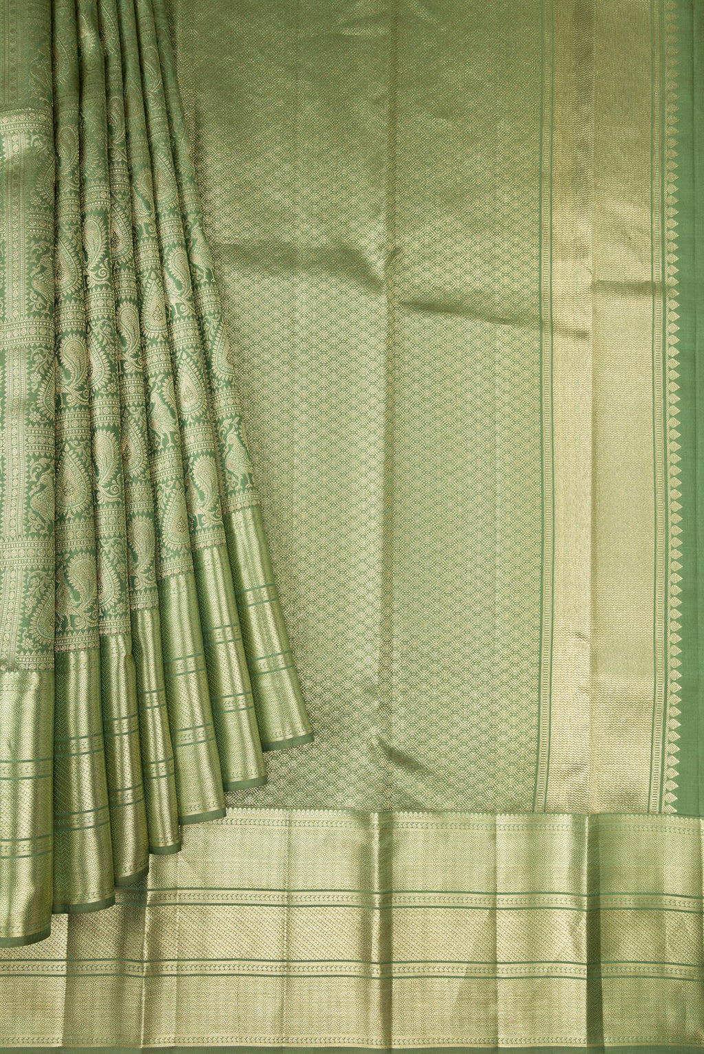 Pleats and pallu of Pista Green Dual Tone Kanchipuram Silk Saree with Zari Brocade on the body and Zari Border. 