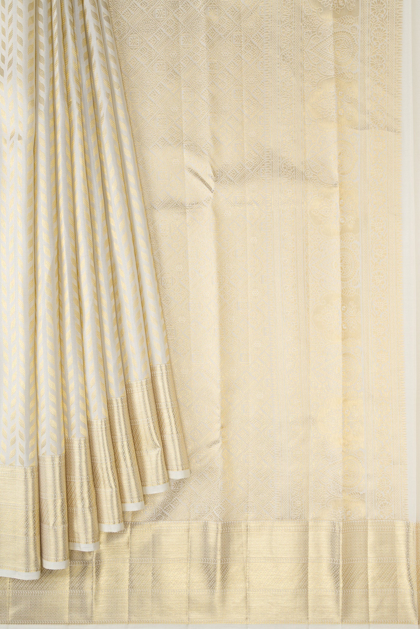Pleats and pallu of Off White Dual Tone Kanchipuram Silk Saree with Zari Brocade on the body and Zari Border. 