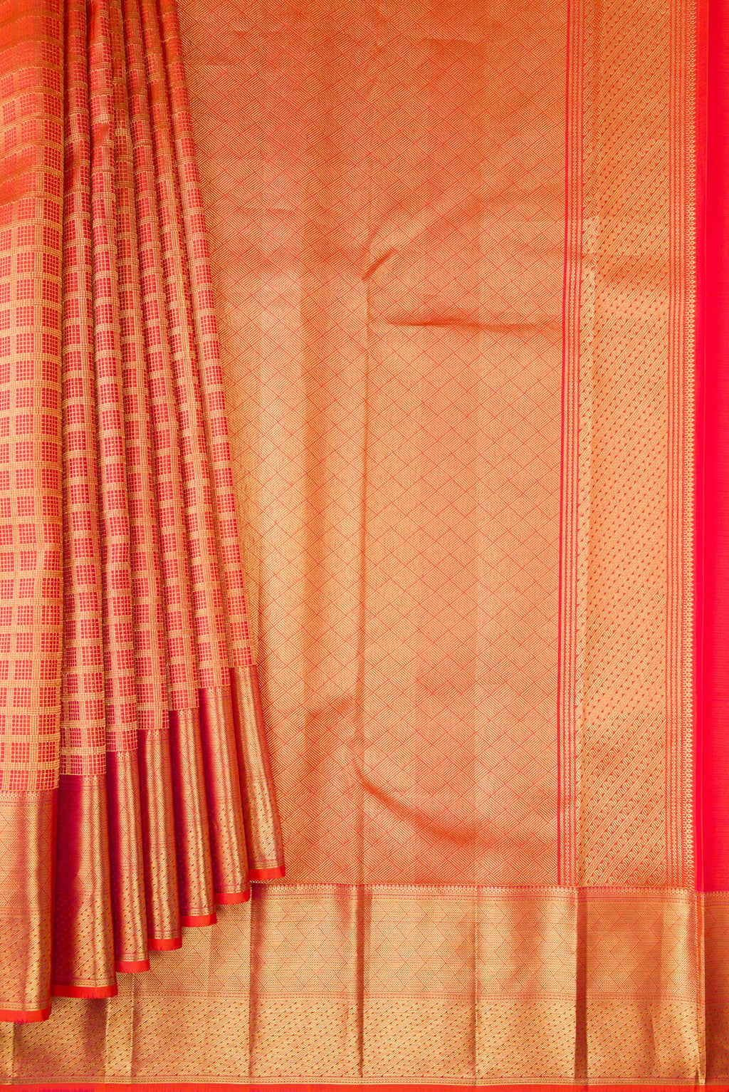 Pleats and pallu of Orange Dual Tone Kanchipuram Silk Saree with Checked design on the body and Zari Border. 