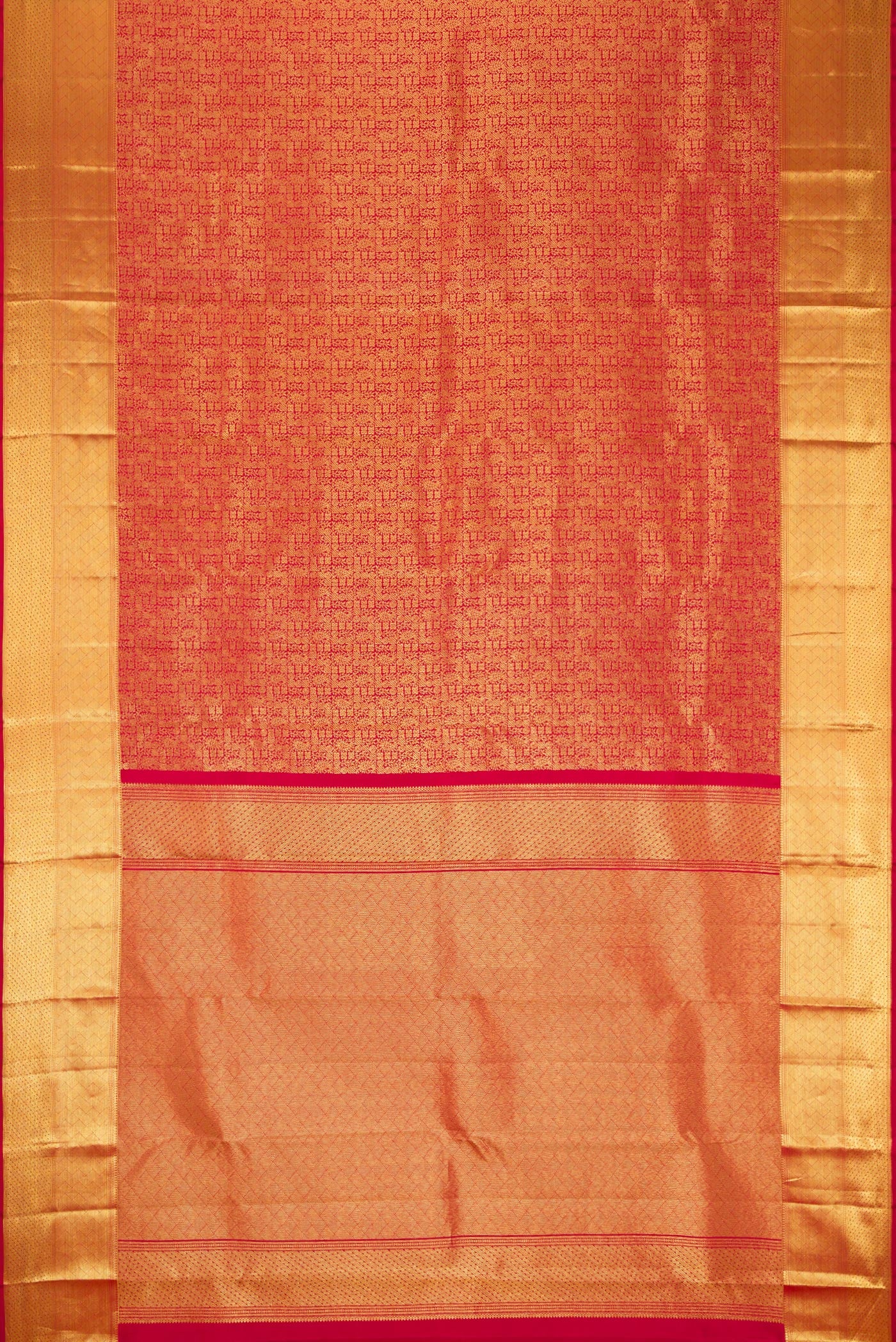 Flat view of Maroon Dual Tone Kanchipuram Silk Saree with Zari Brocade on the body and Zari Border. 