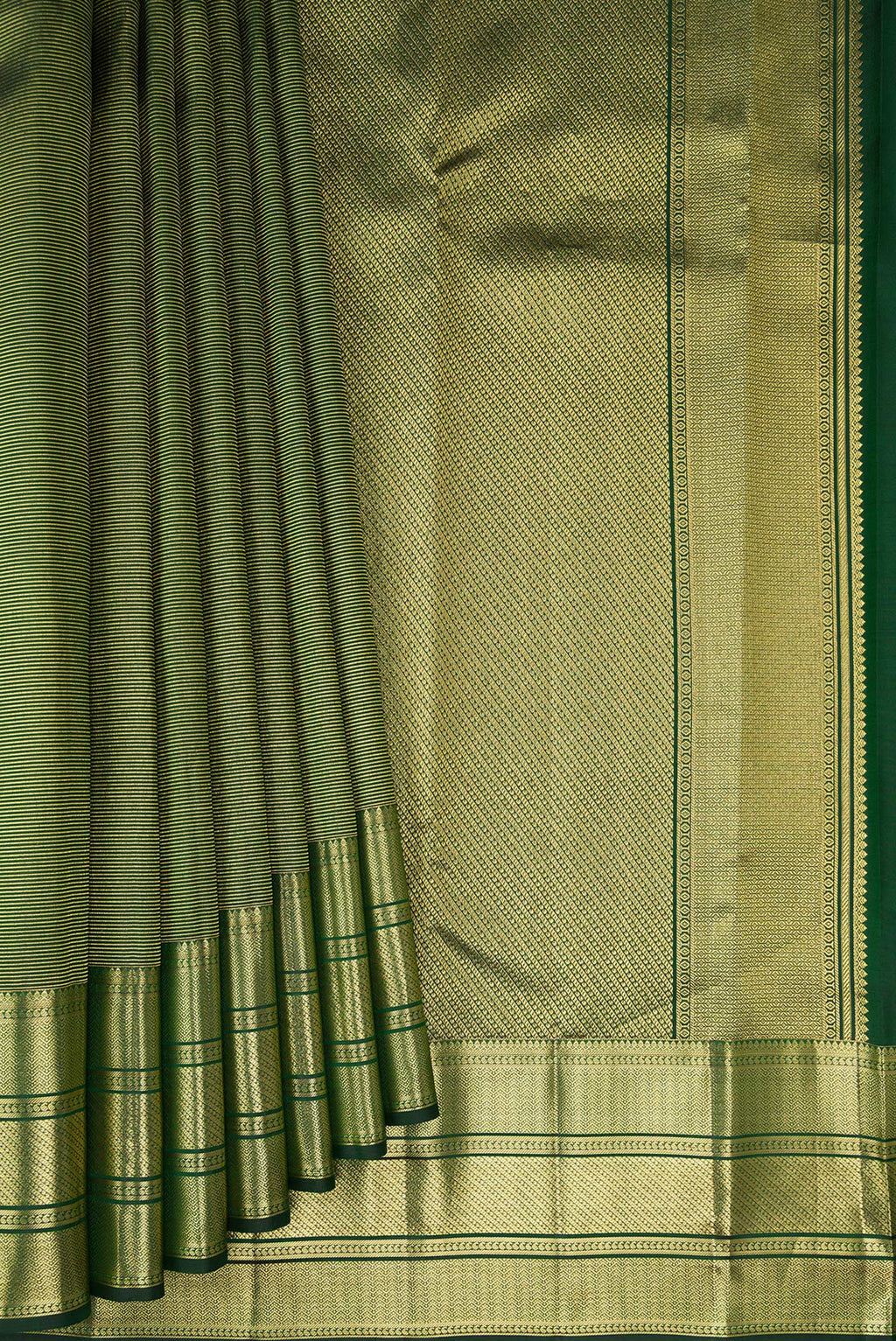 Pleats and pallu of Bottle Green Kanchipuram Silk Saree with Zari Brocade on the body and Fancy Border. 
