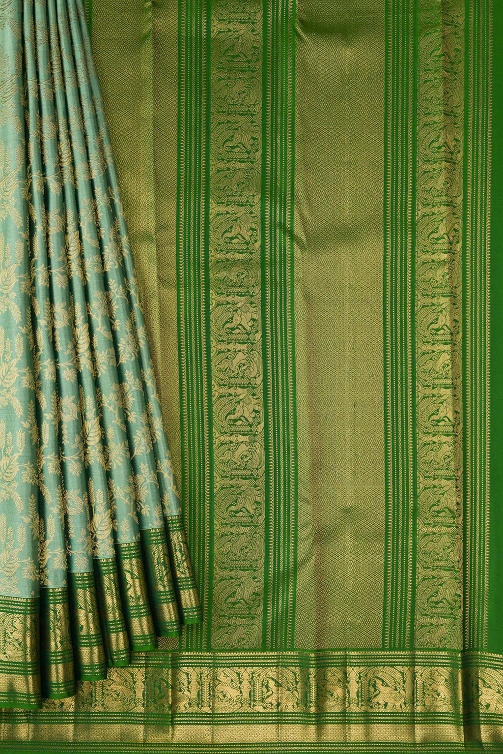 Pleats and pallu of Mehandi Green Dual Tone Kanchipuram Silk Saree with Zari Brocade on the body and Zari Border. 