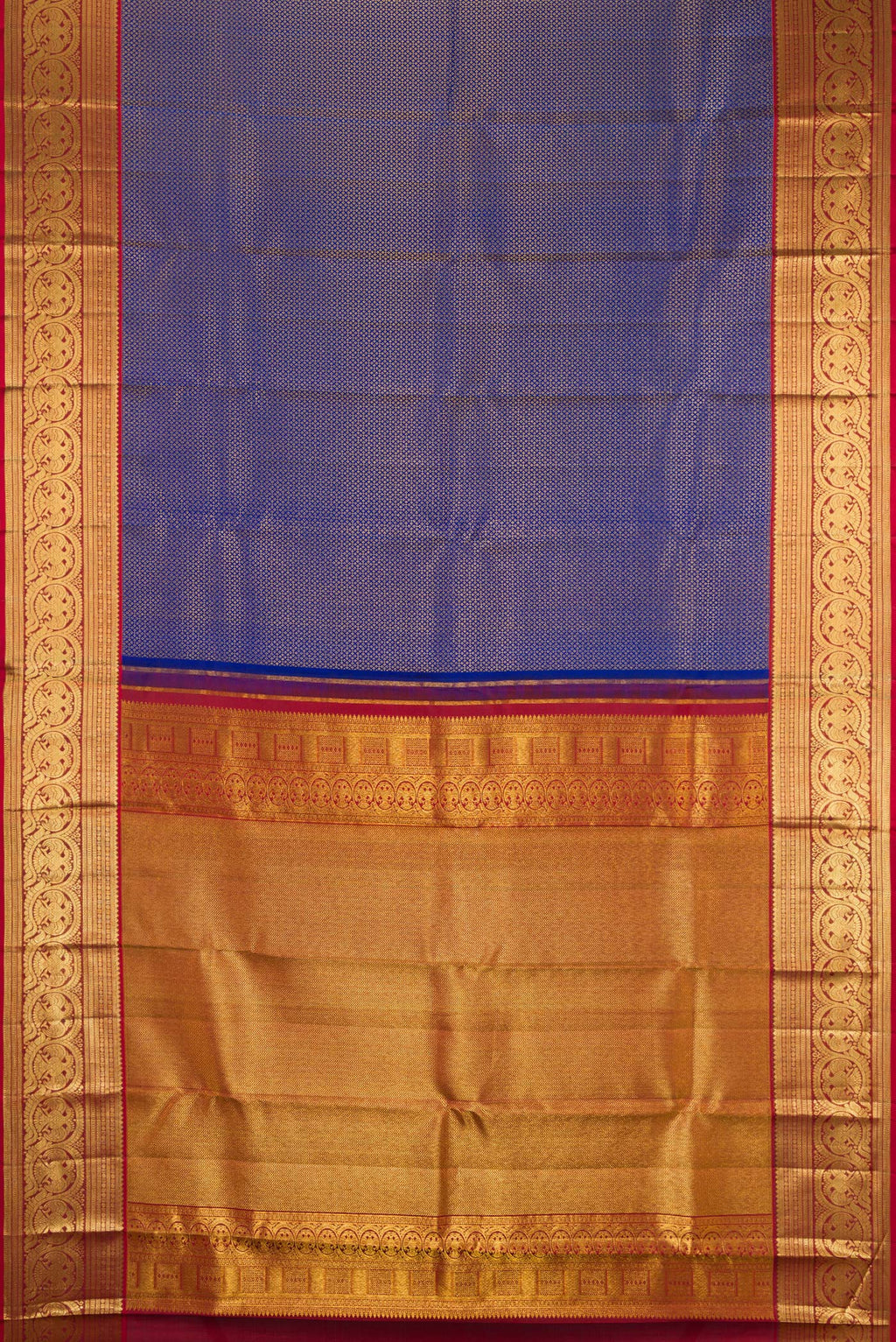 Flat view of Royal Blue Kanchipuram Silk Saree with Zari Brocade on the body and Zari Border. 