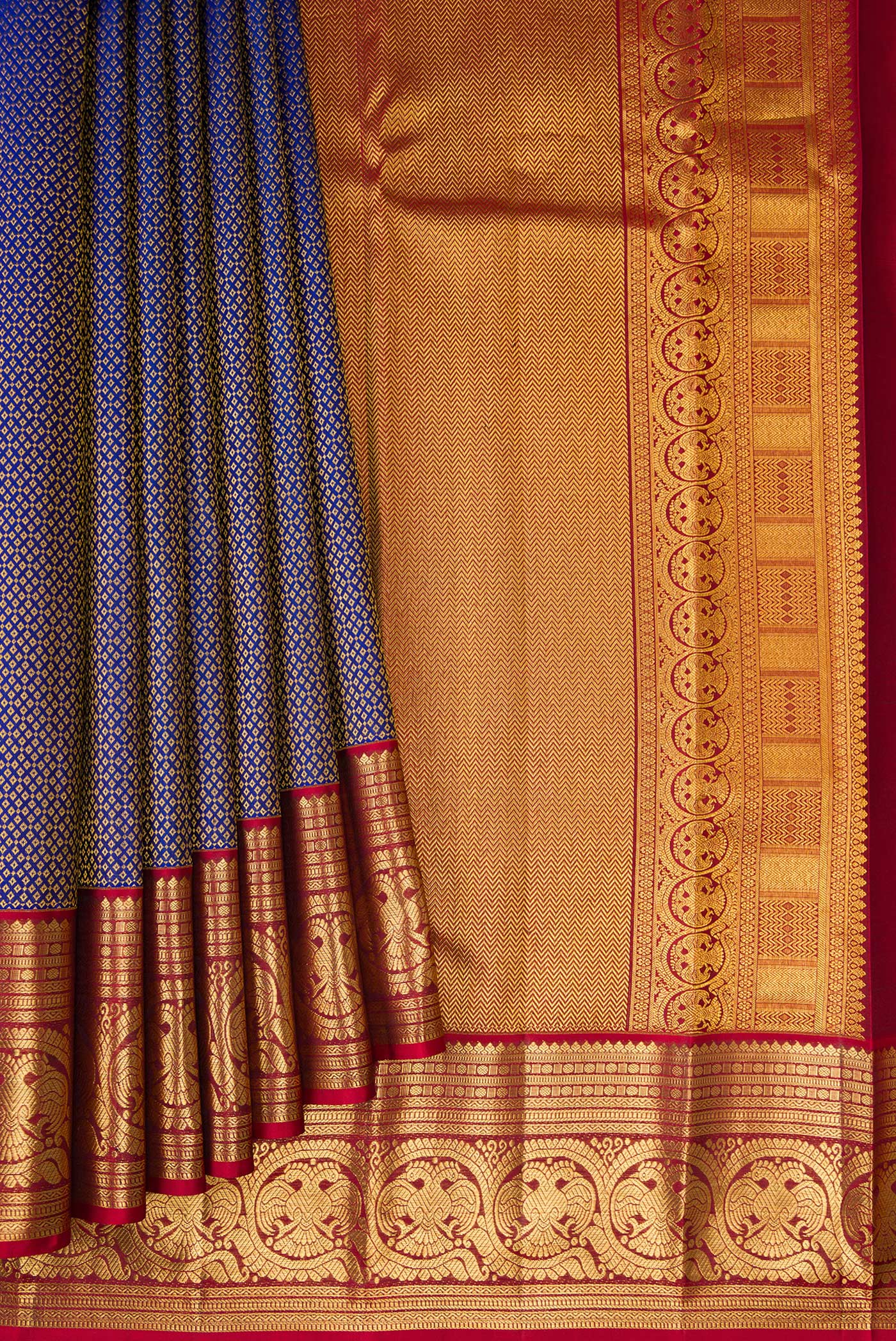 Pleats and pallu of Royal Blue Kanchipuram Silk Saree with Zari Brocade on the body and Zari Border. 
