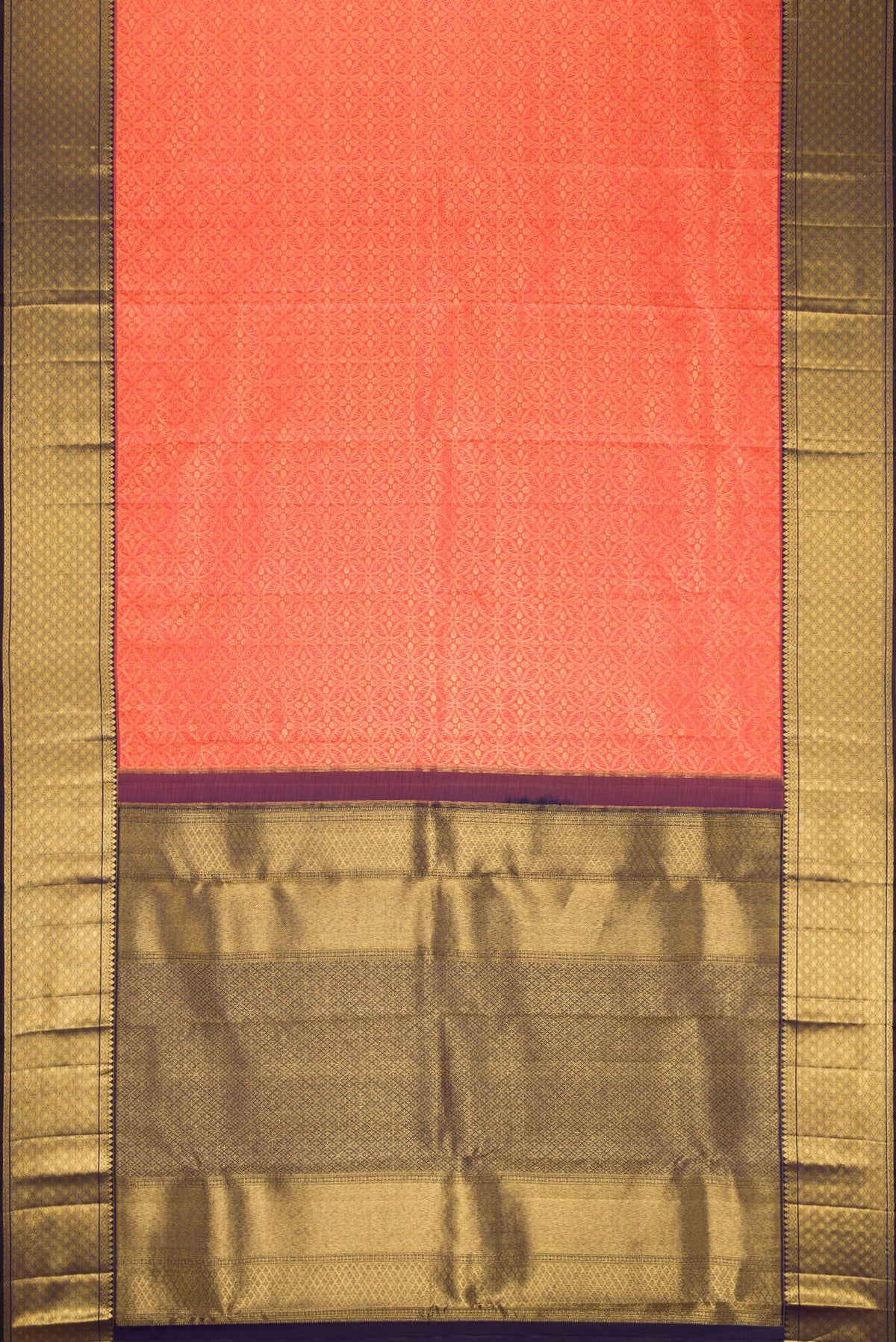 Flat view of Coral Dual Tone Kanchipuram Silk Saree with Zari Brocade on the body and Zari Border. 