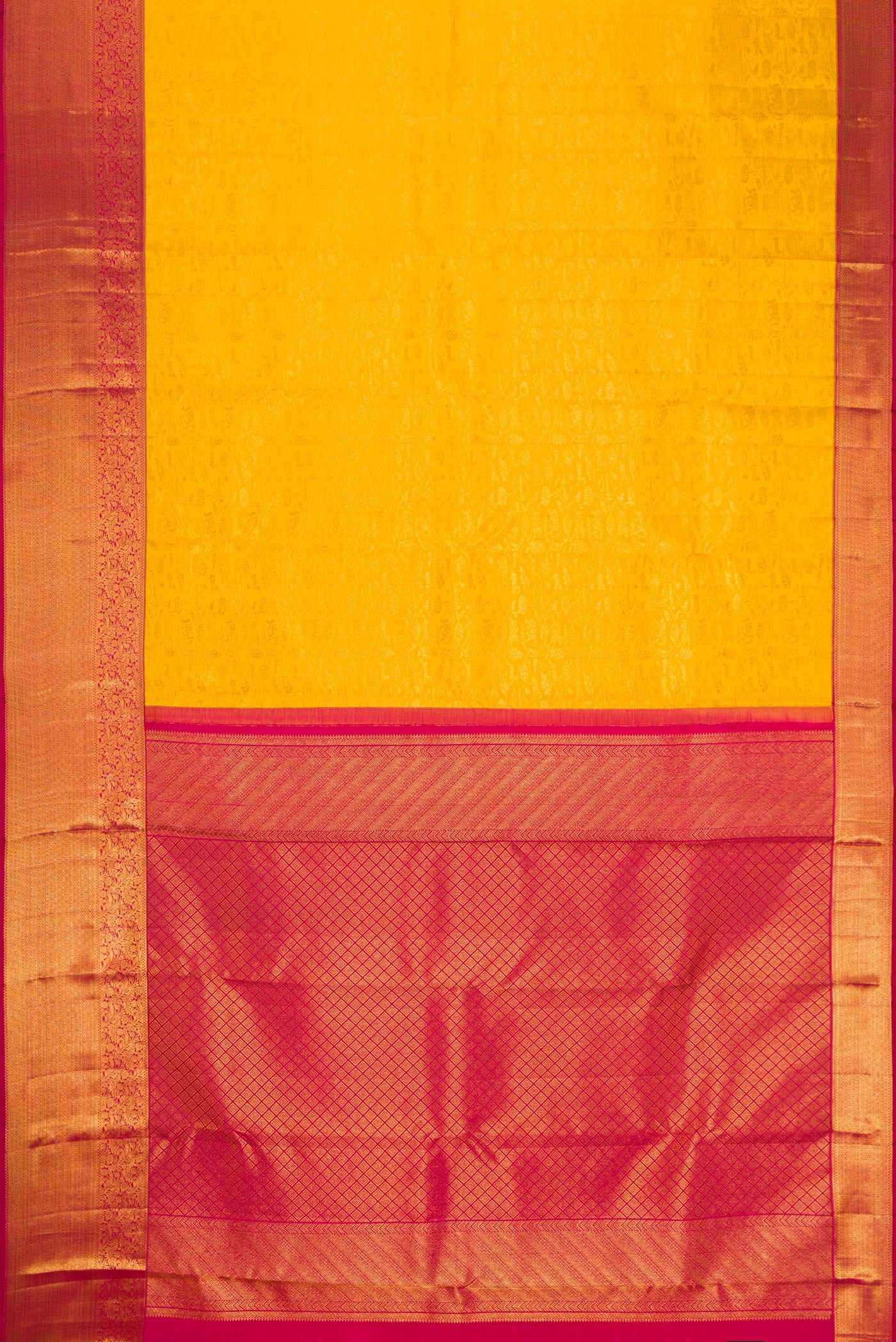 Flat view of Yellow Kanchipuram Silk Saree with Zari Brocade on the body and Zari Border. 