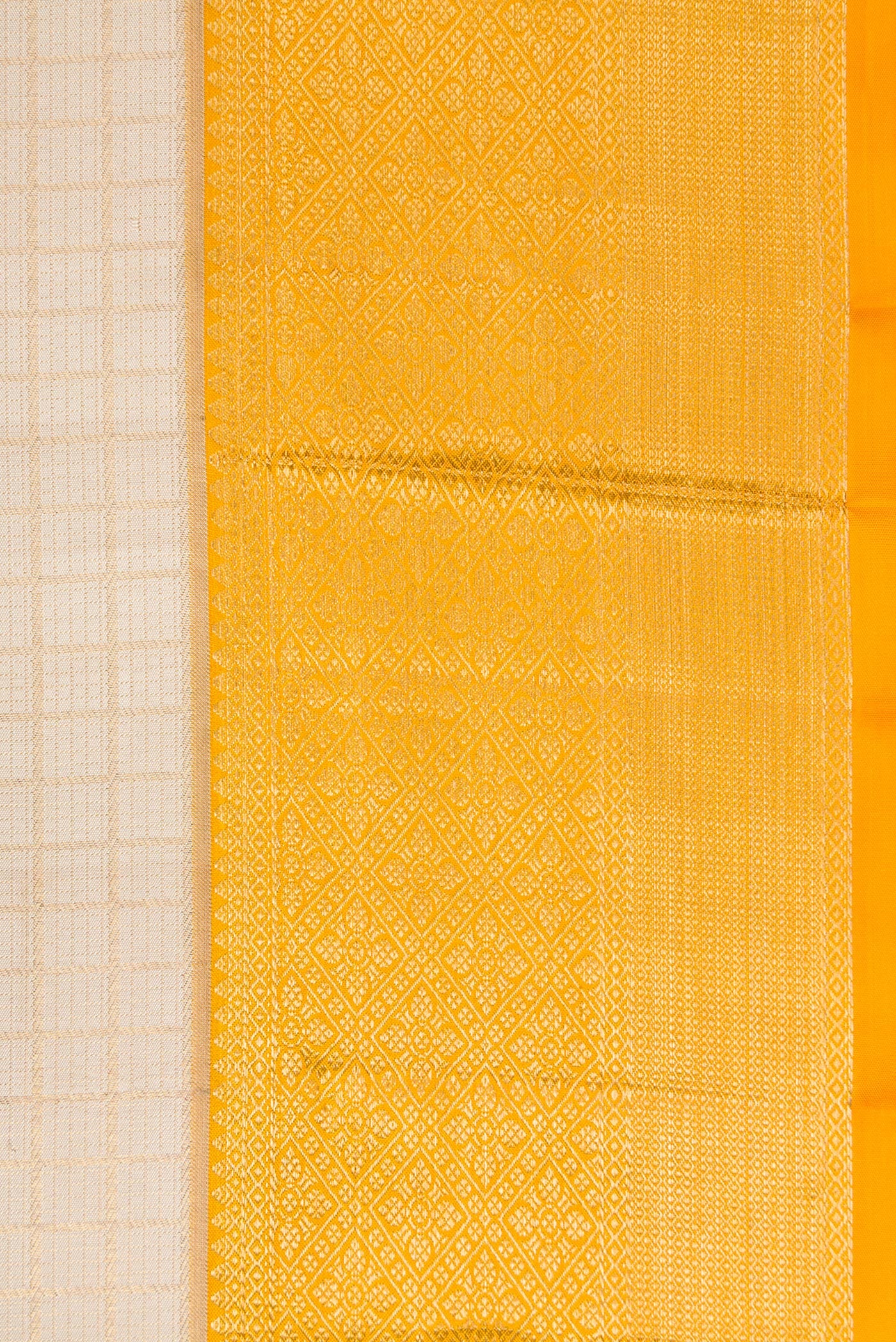 Border image of Beige Dual Tone Kanchipuram Silk Saree with Checked design on the body and Zari Border. 