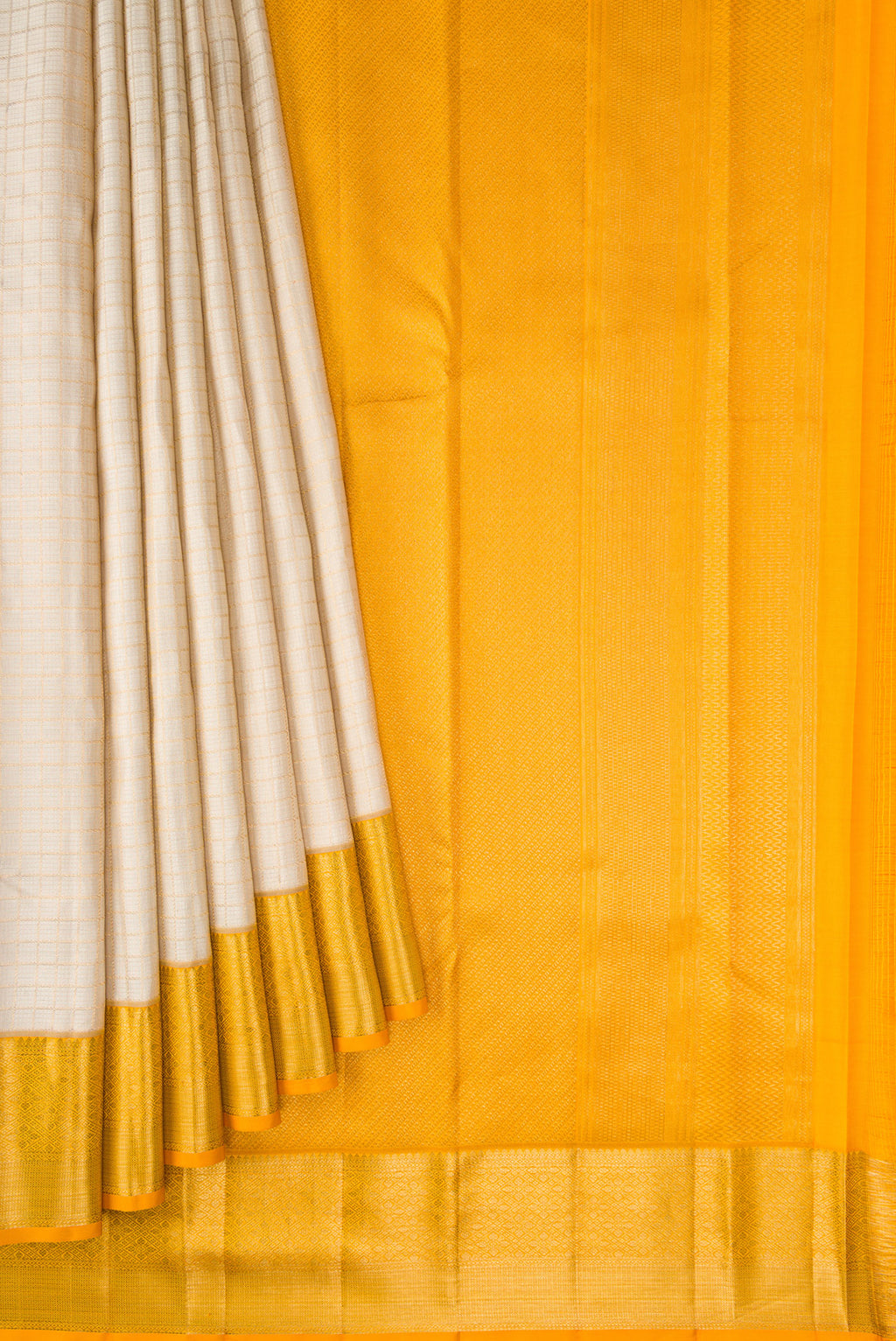 Pleats and pallu of Beige Dual Tone Kanchipuram Silk Saree with Checked design on the body and Zari Border. 