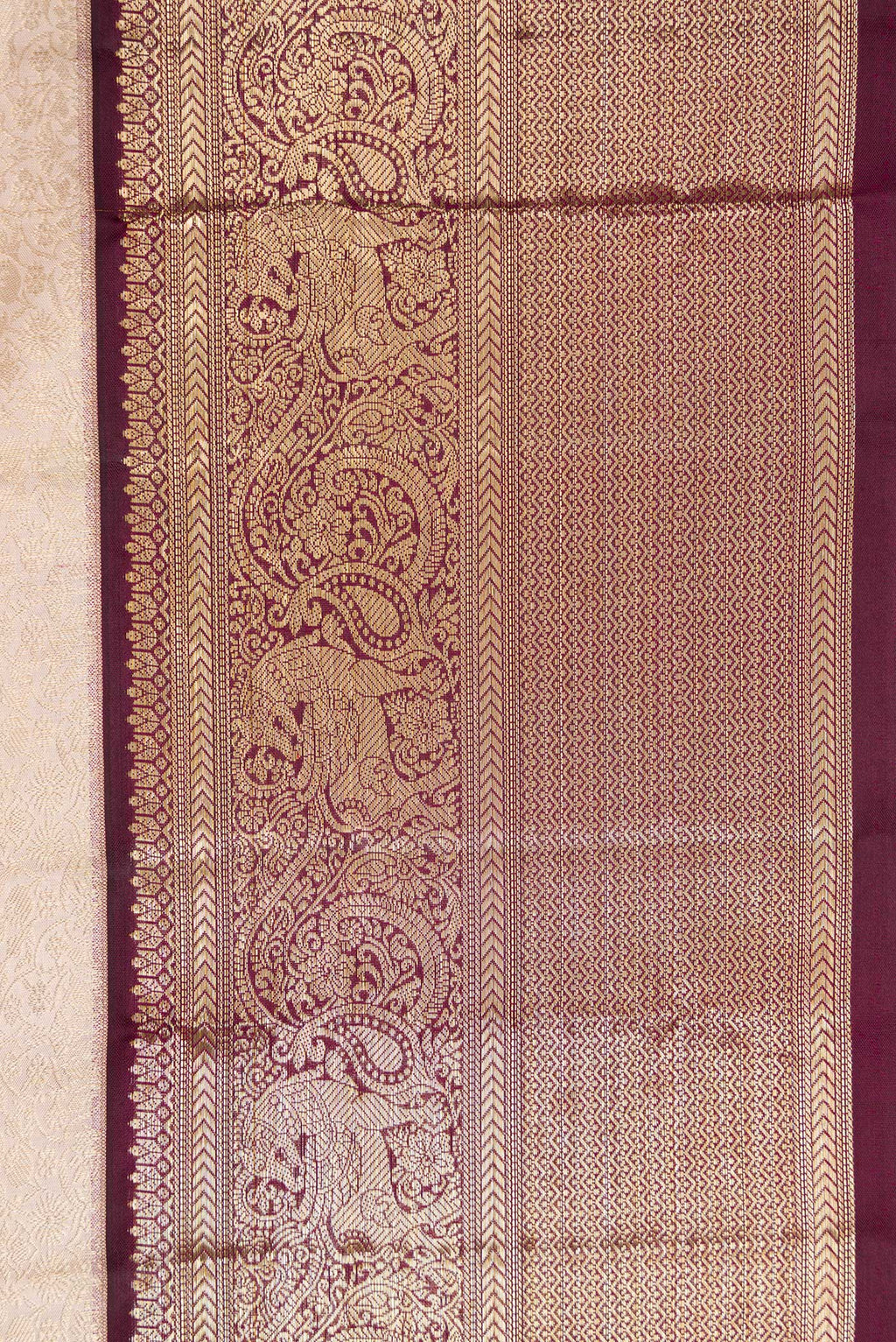 Border image of Brown Dual Tone Kanchipuram Silk Saree with Zari Brocade on the body and Zari Border. 