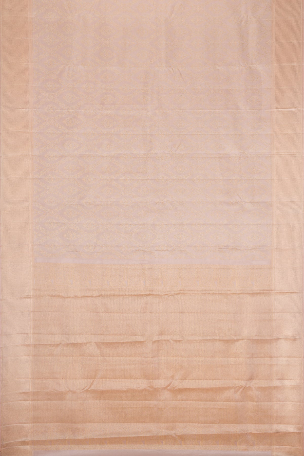 Flat view of Rose Gold Dual Tone Kanchipuram Silk Saree with Zari Brocade on the body and Zari Border. 