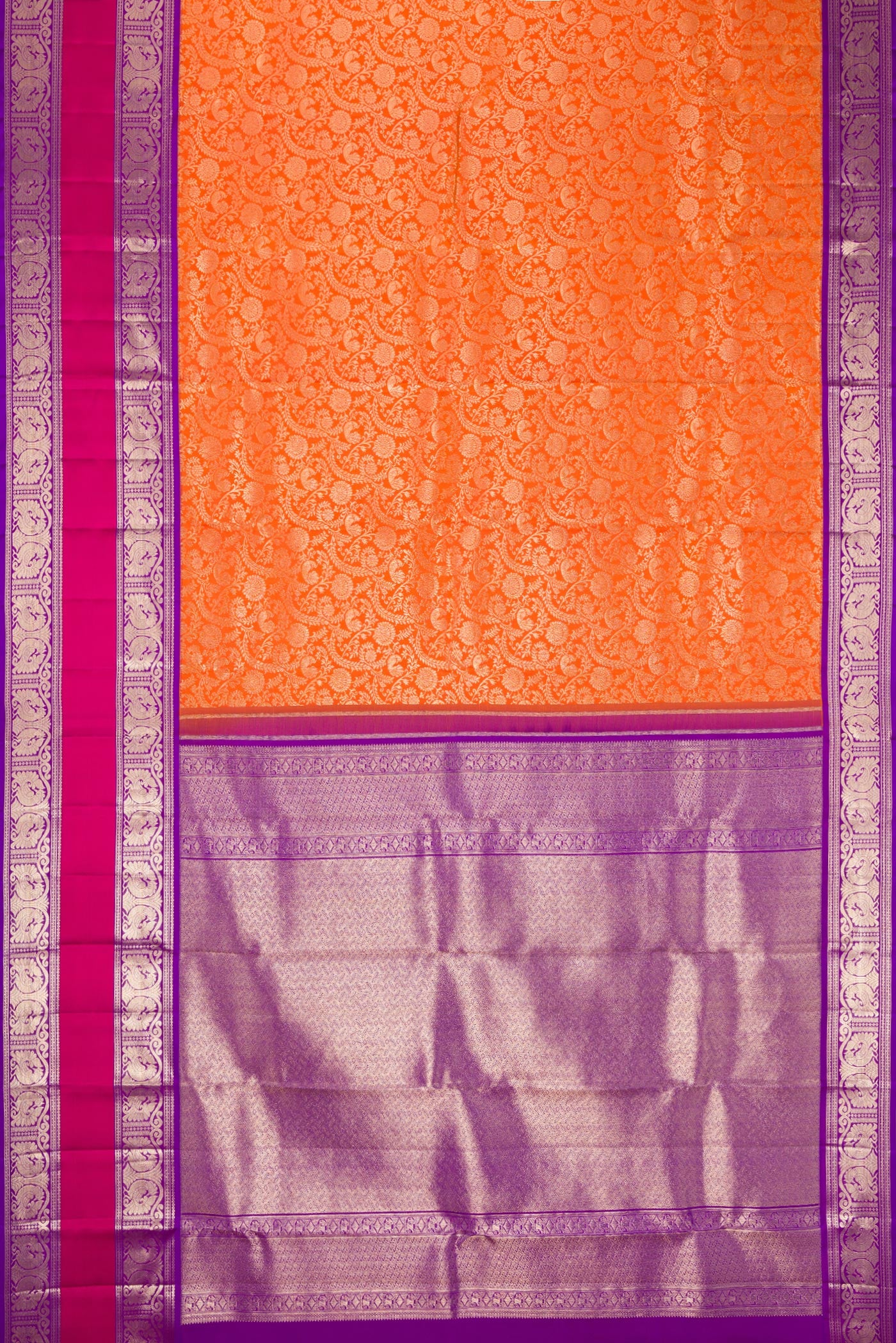 Flat view of Orange Dual Tone Kanchipuram Silk Saree with Zari Brocade on the body and Zari Border. 
