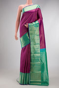 Purple Dual Tone Kanchipuram Silk Saree with Zari Brocade on the body and Zari Border.  displayed on a mannequin