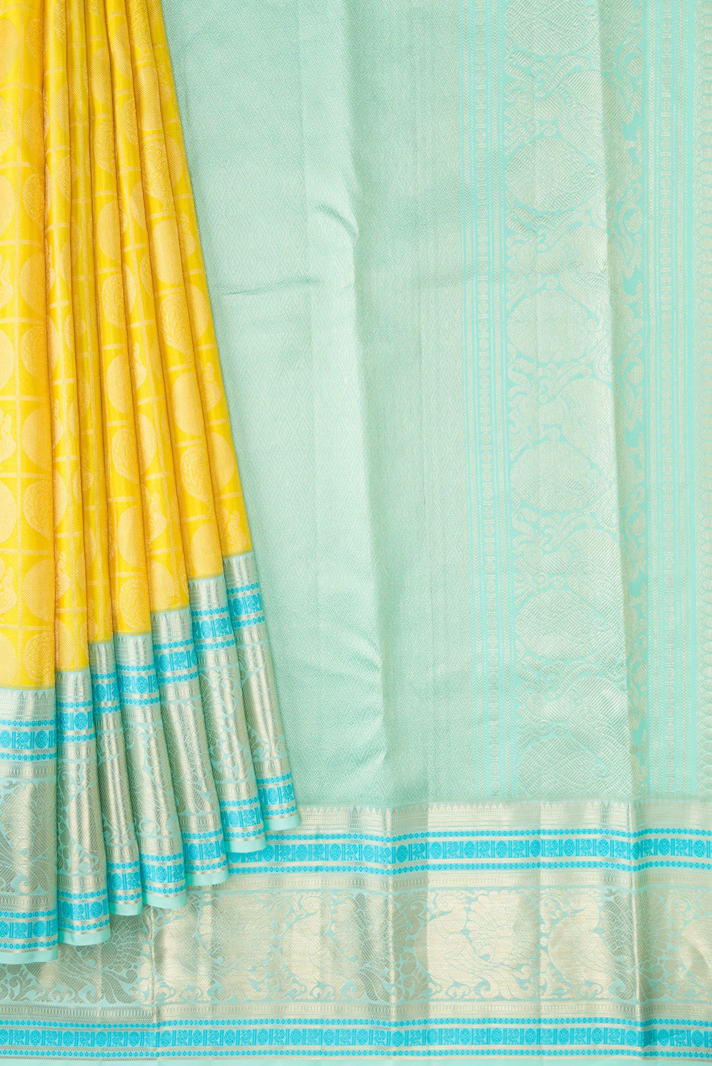 Pleats and pallu of Yellow Dual Tone Kanchipuram Silk Saree with Zari Brocade on the body and Zari Border. 